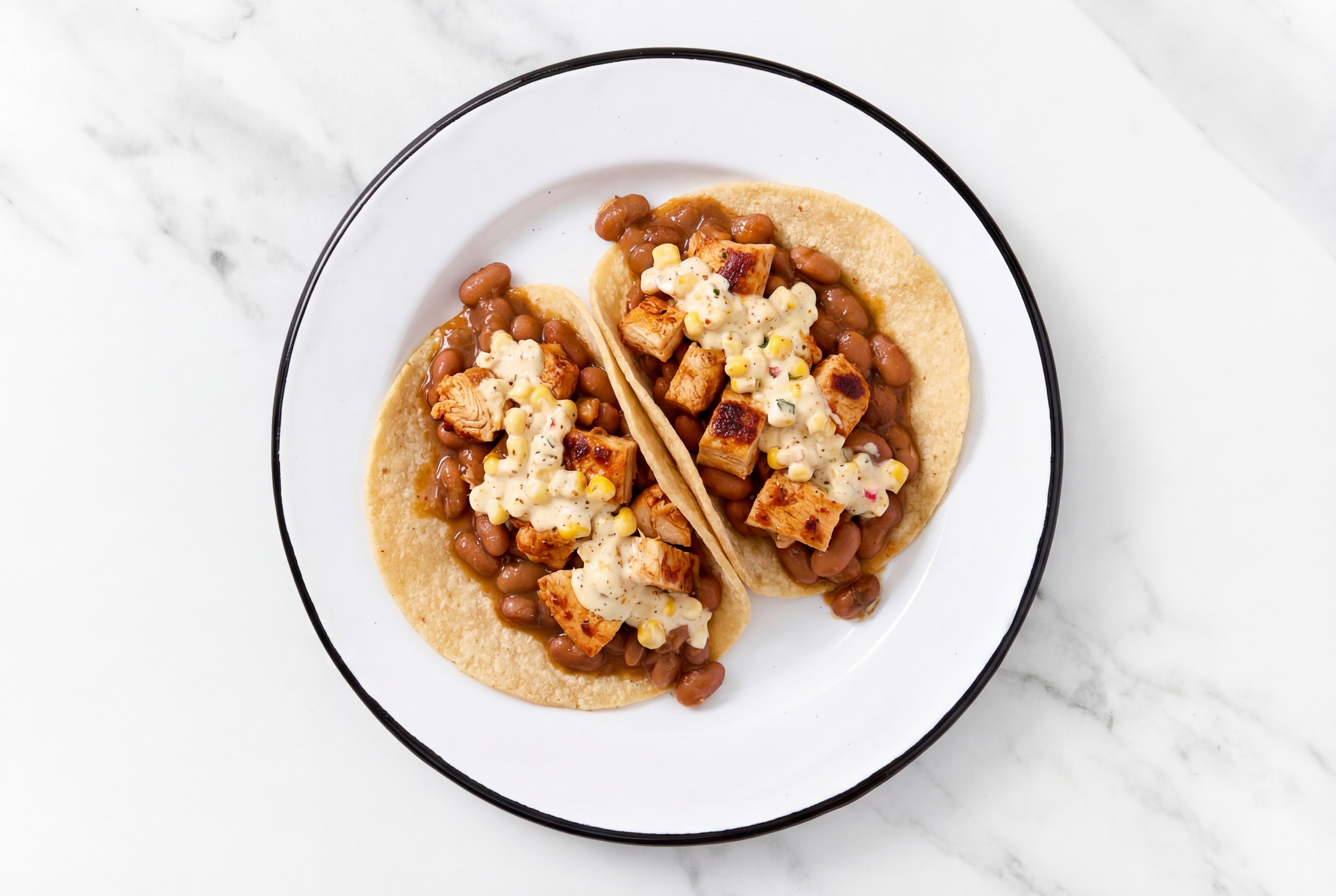 Chipotle Chicken Tacos with Street Corn Sauce & Pinto Beans