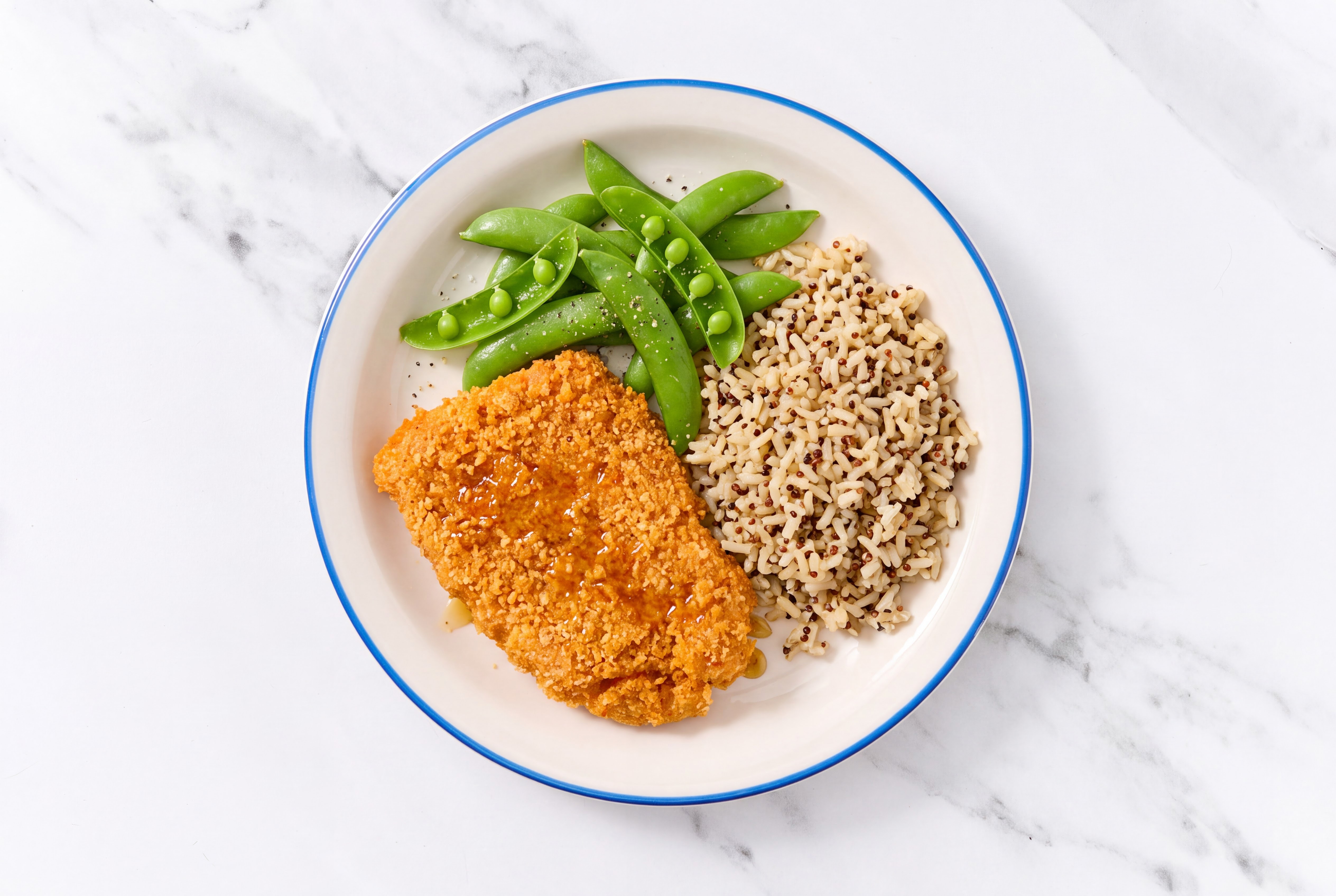 Hot Honey Breaded Chicken Cutlet with Snap Peas & Brown Rice