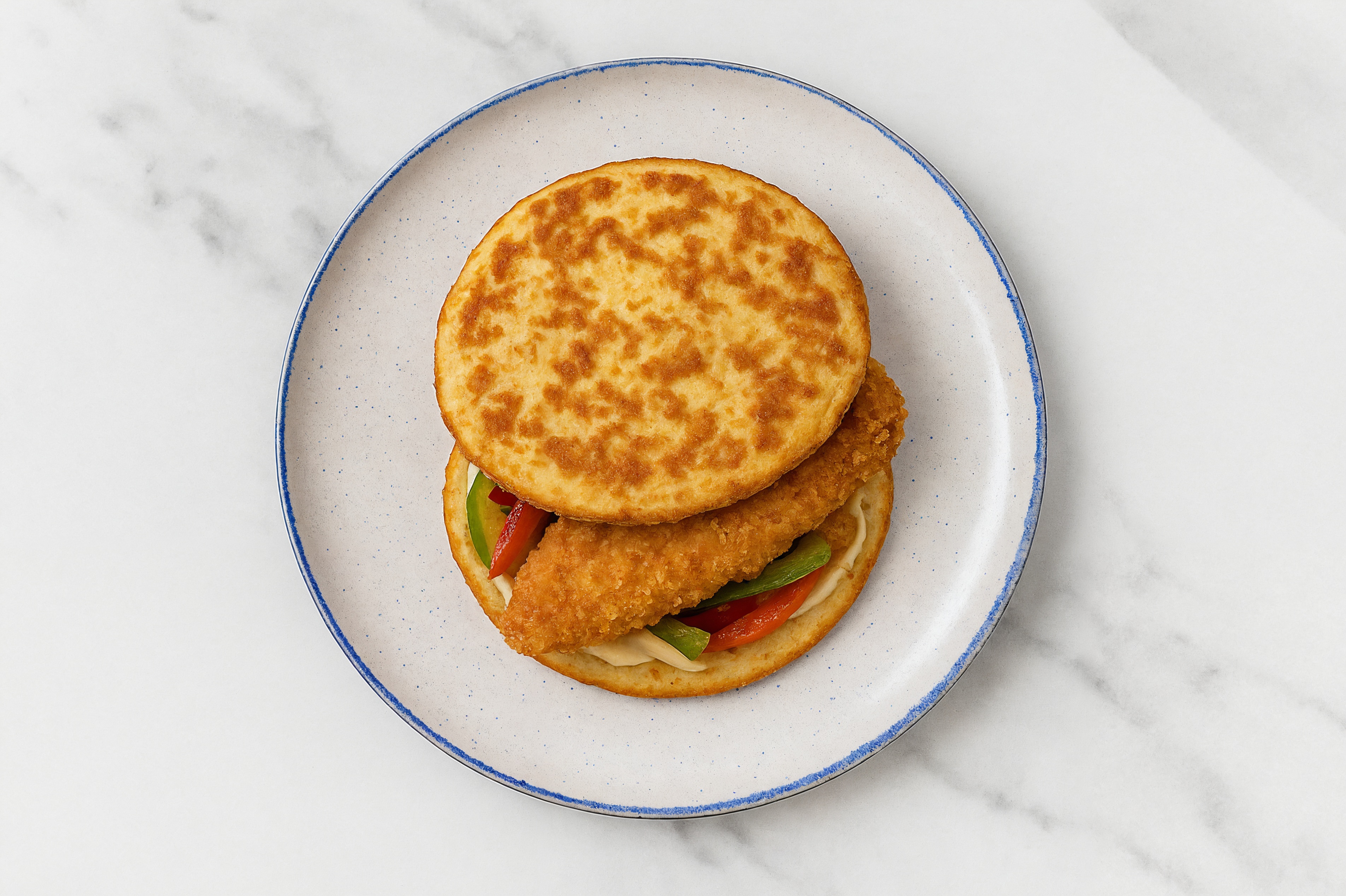 Creamy Horseradish "Chicken" Tenders Sandwich with Peppers + Onion on Cauliflower Rounds