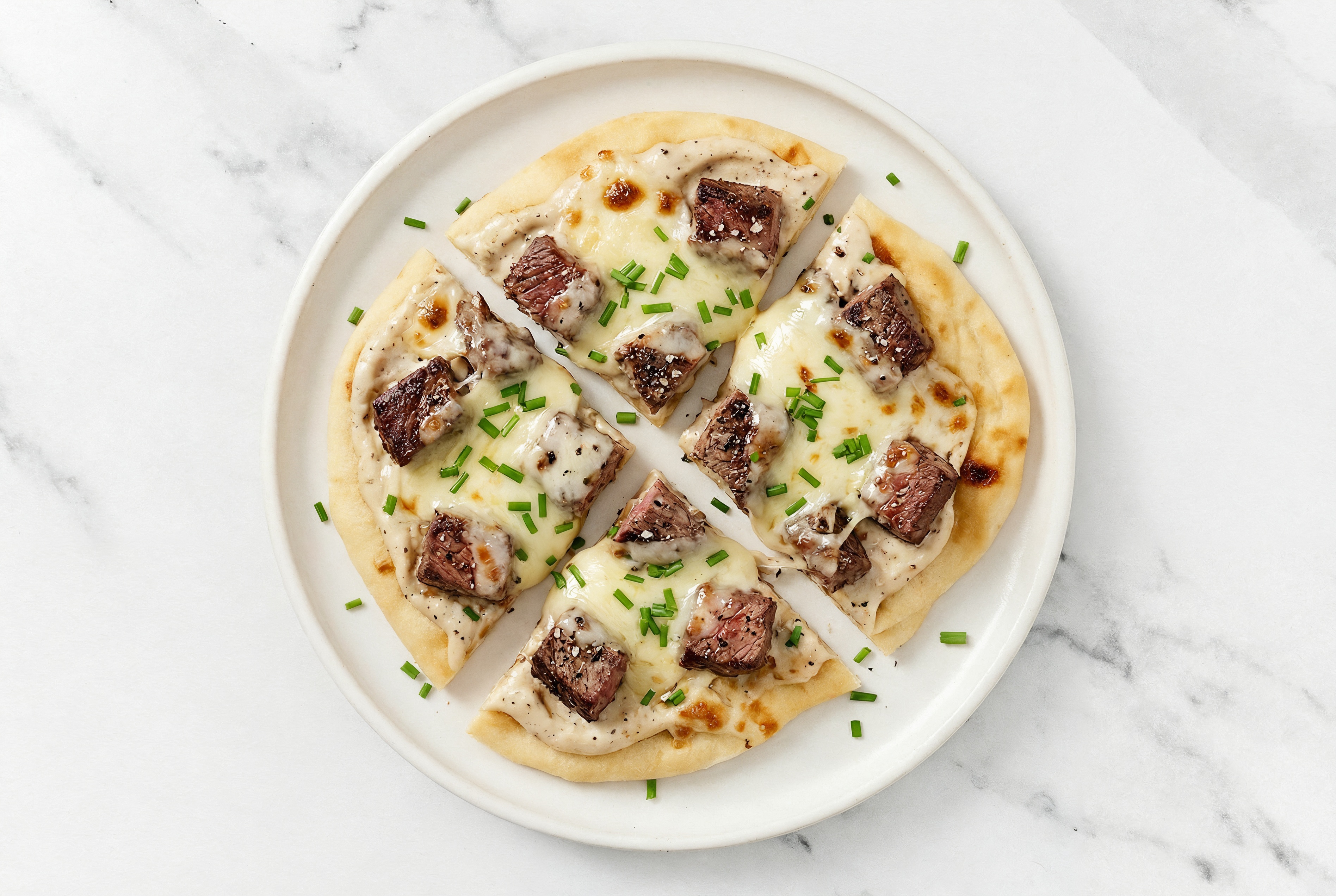 Umami Truffle Filet Mignon Naan Pizza with Mild Havarti + Fresh Chives