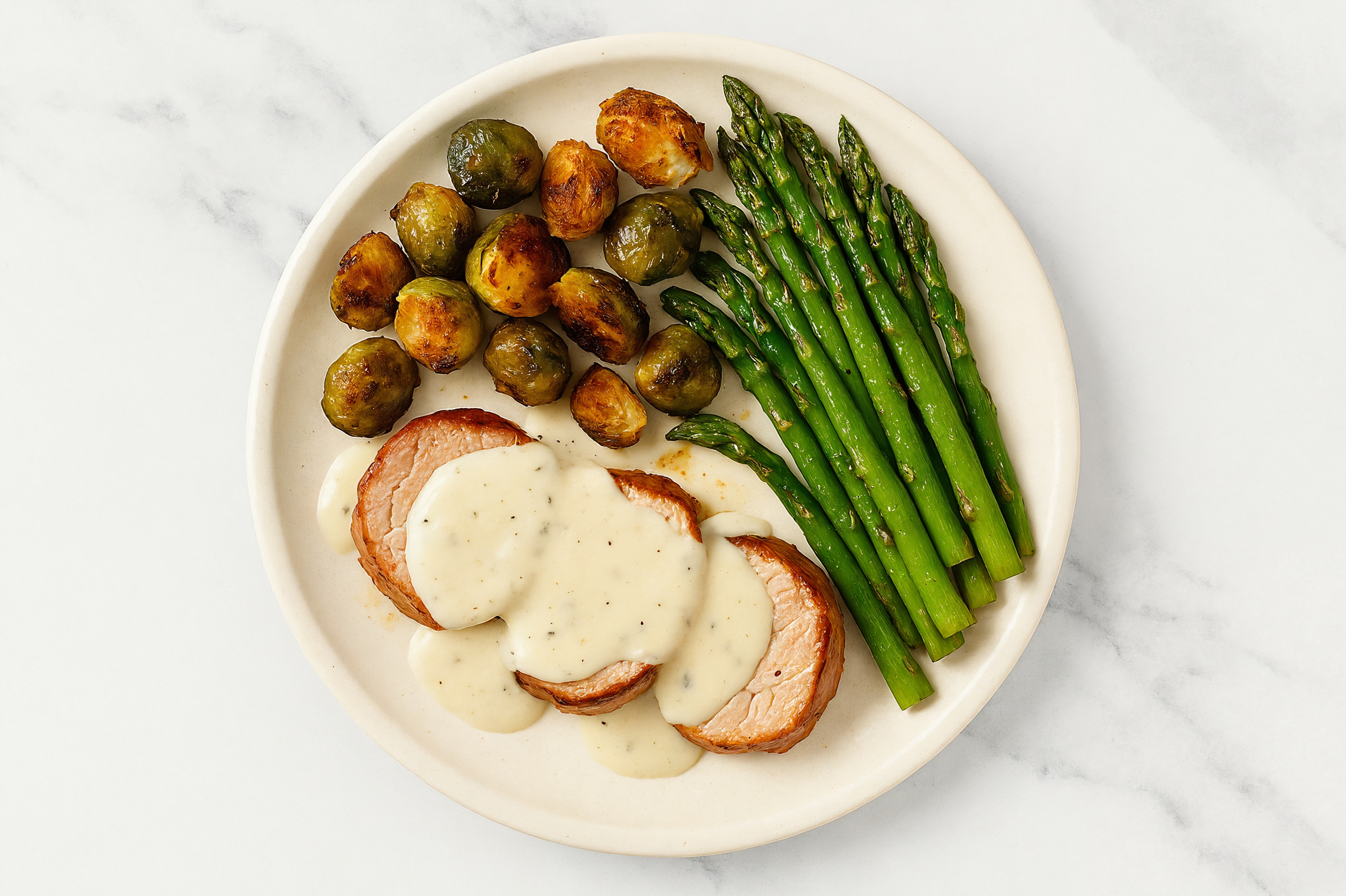 Creamy Parmesan Smothered Pork Tenderloin with Asparagus & Roasted Brussels