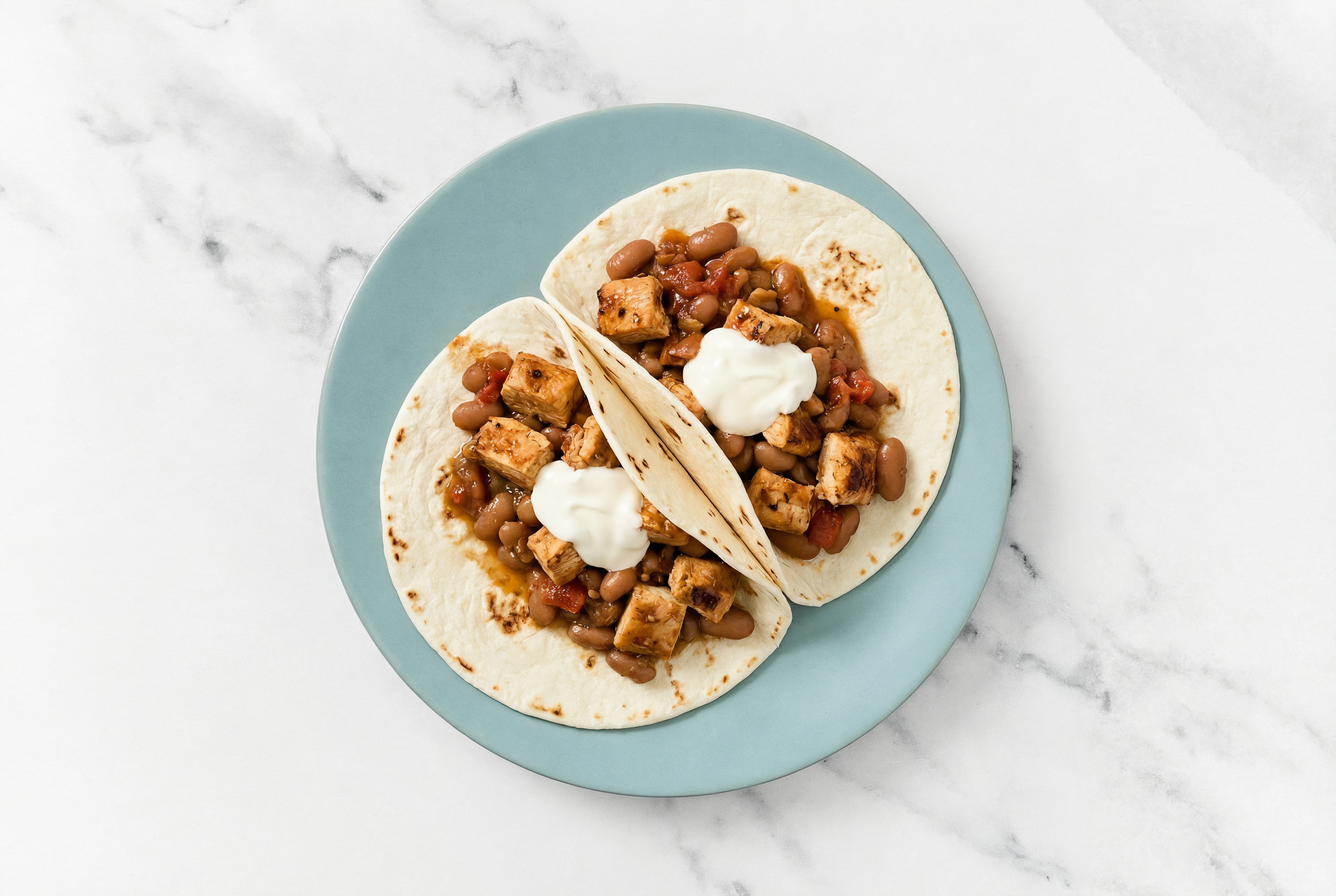 Chipotle Chicken Tacos with Crema & Pinto Beans