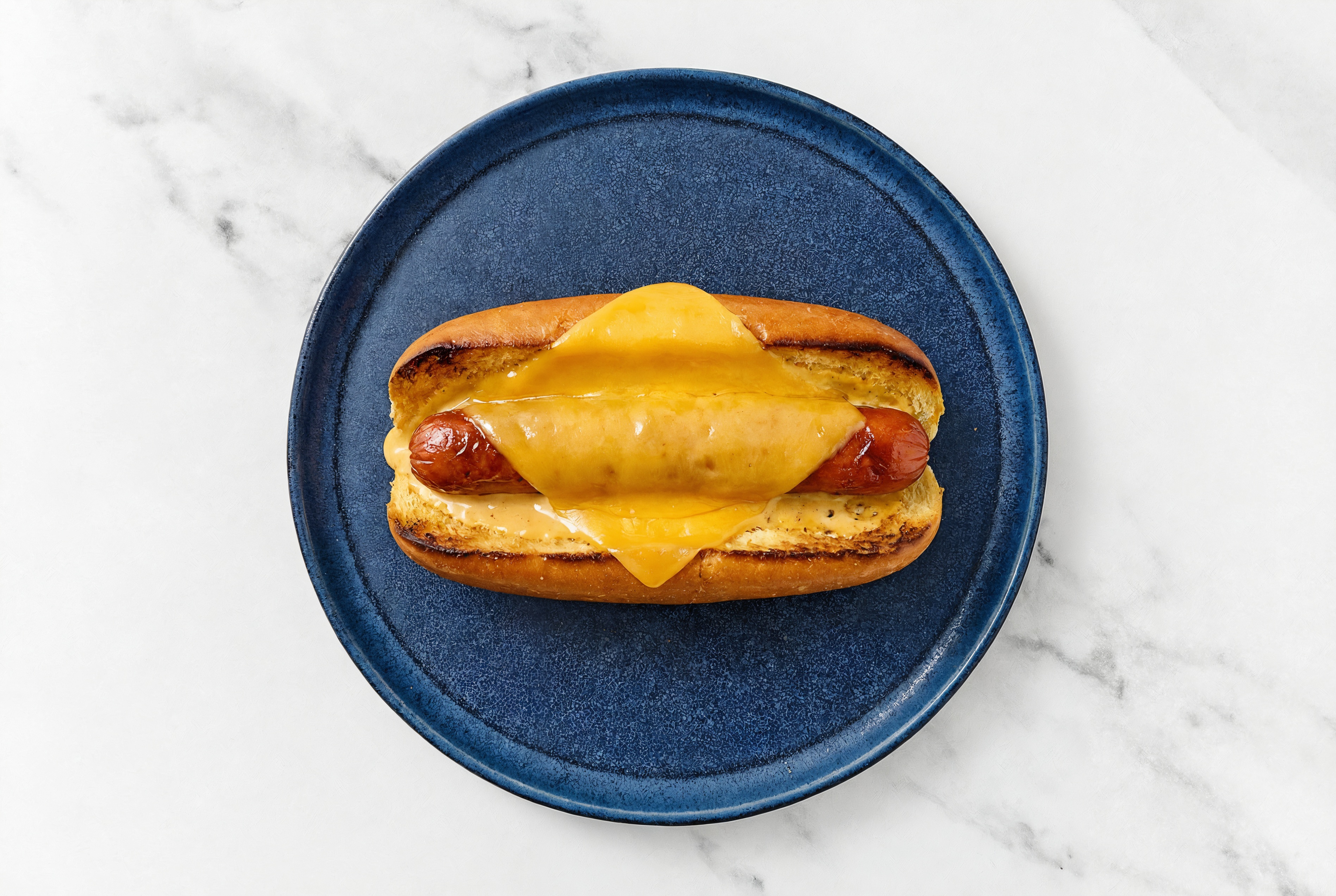 Cheddar Beef Hot Dog with Super Special Sauce on Brioche