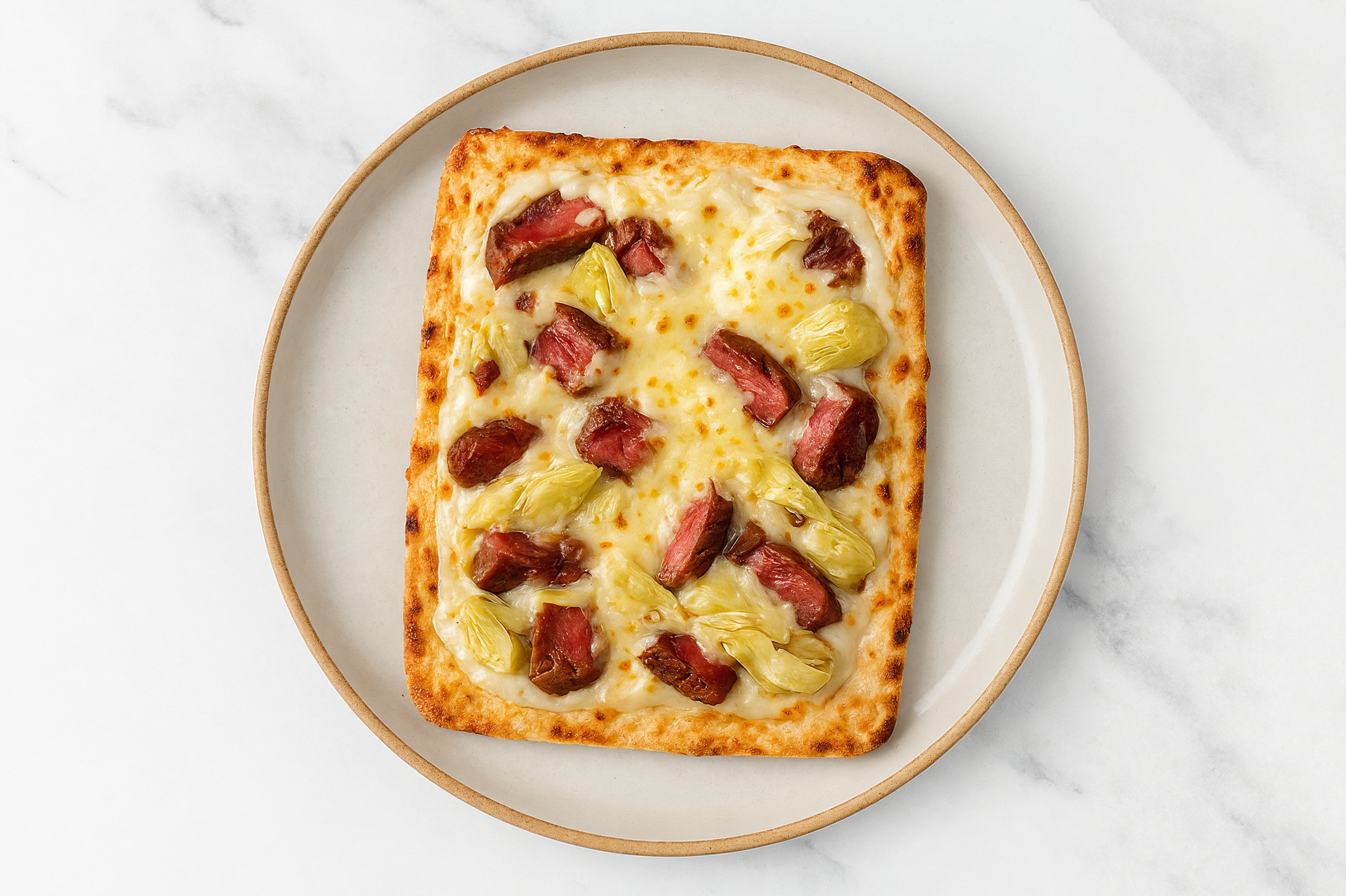 Cheesy Sirloin + Artichoke Pizza