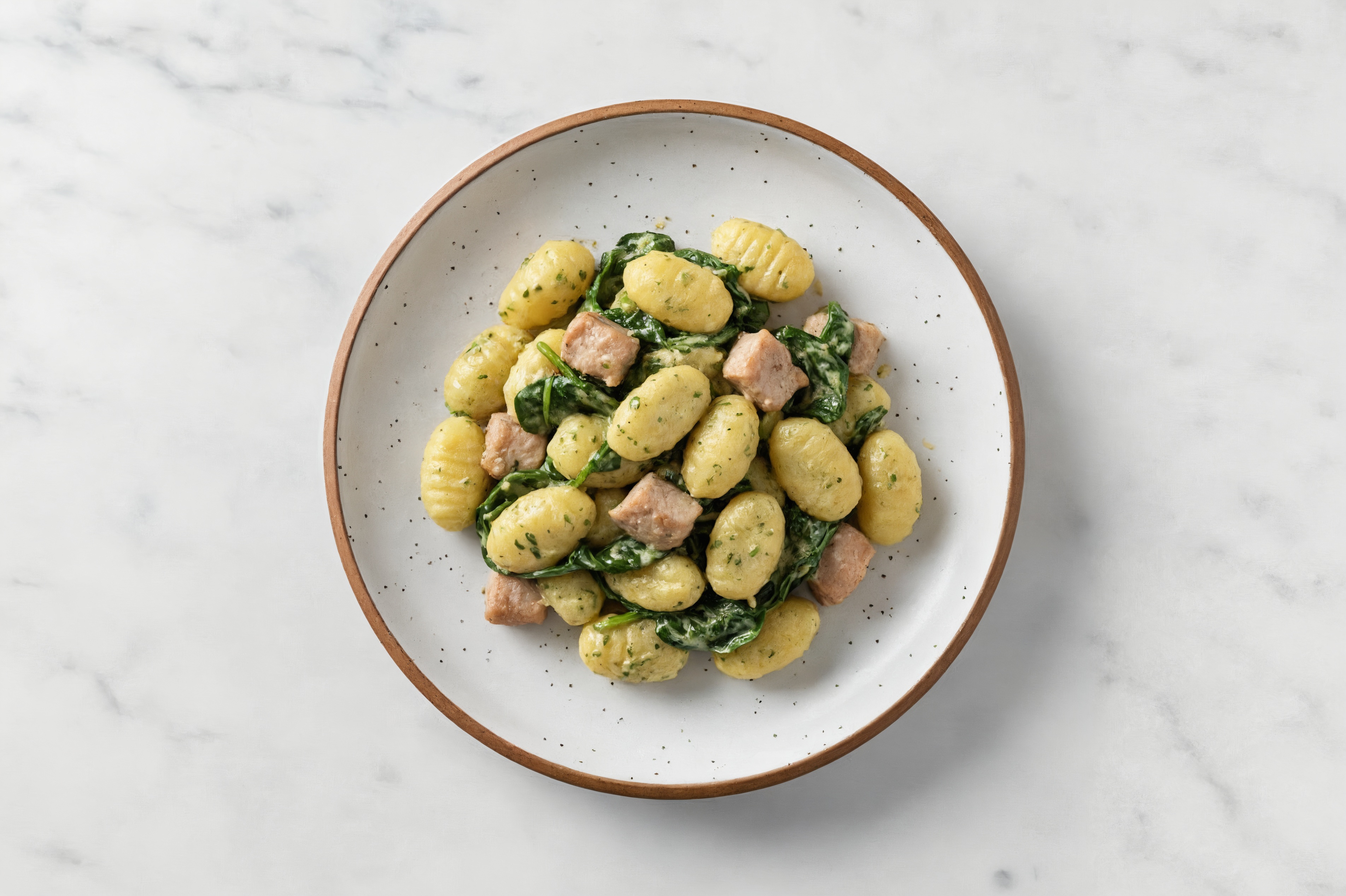 Spinach Artichoke Gnocchi with Pork Chops & Spinach
