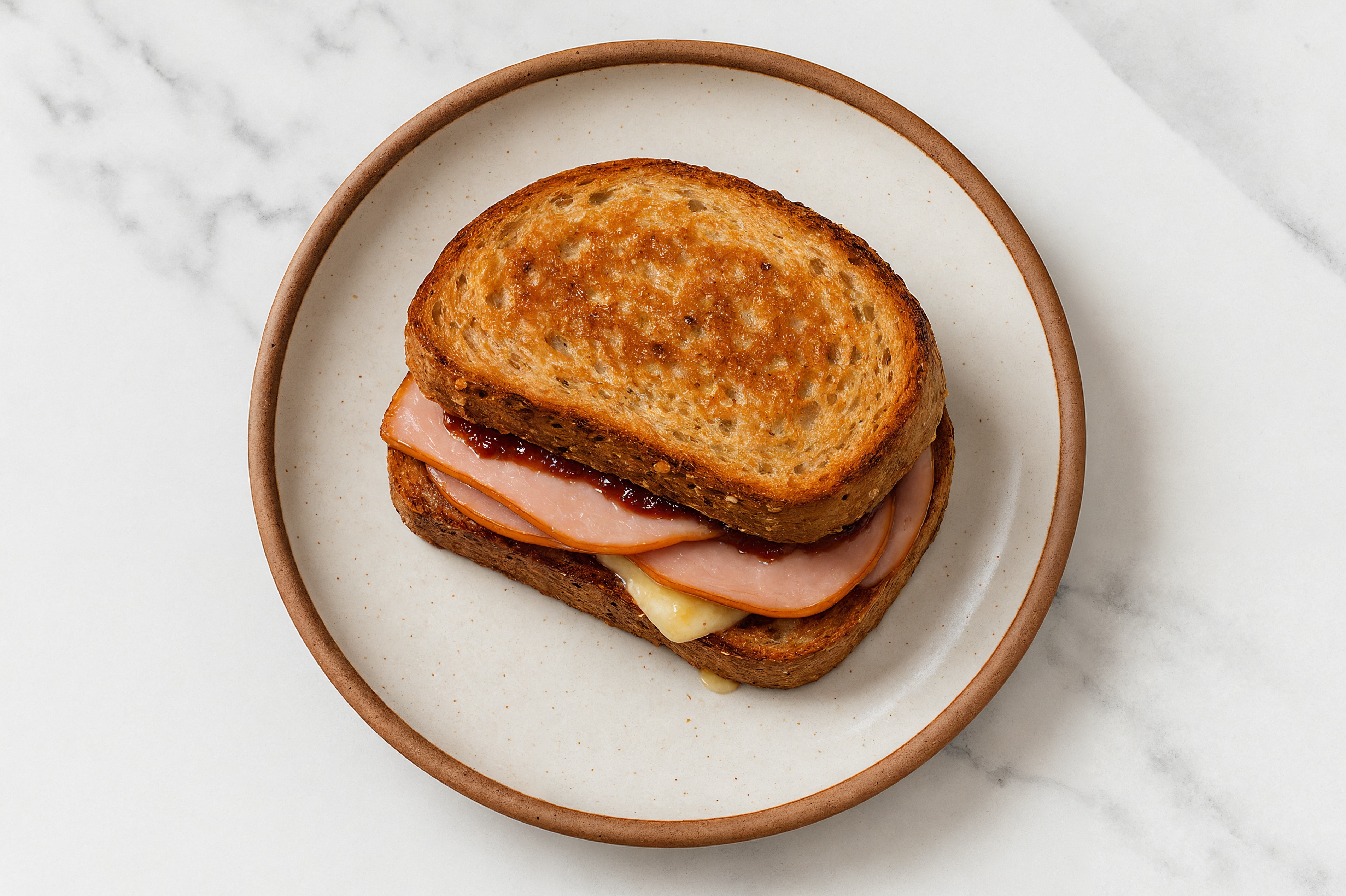 Ham, Brie + Strawberry Jam Multgrain Sourdough Grilled Cheese