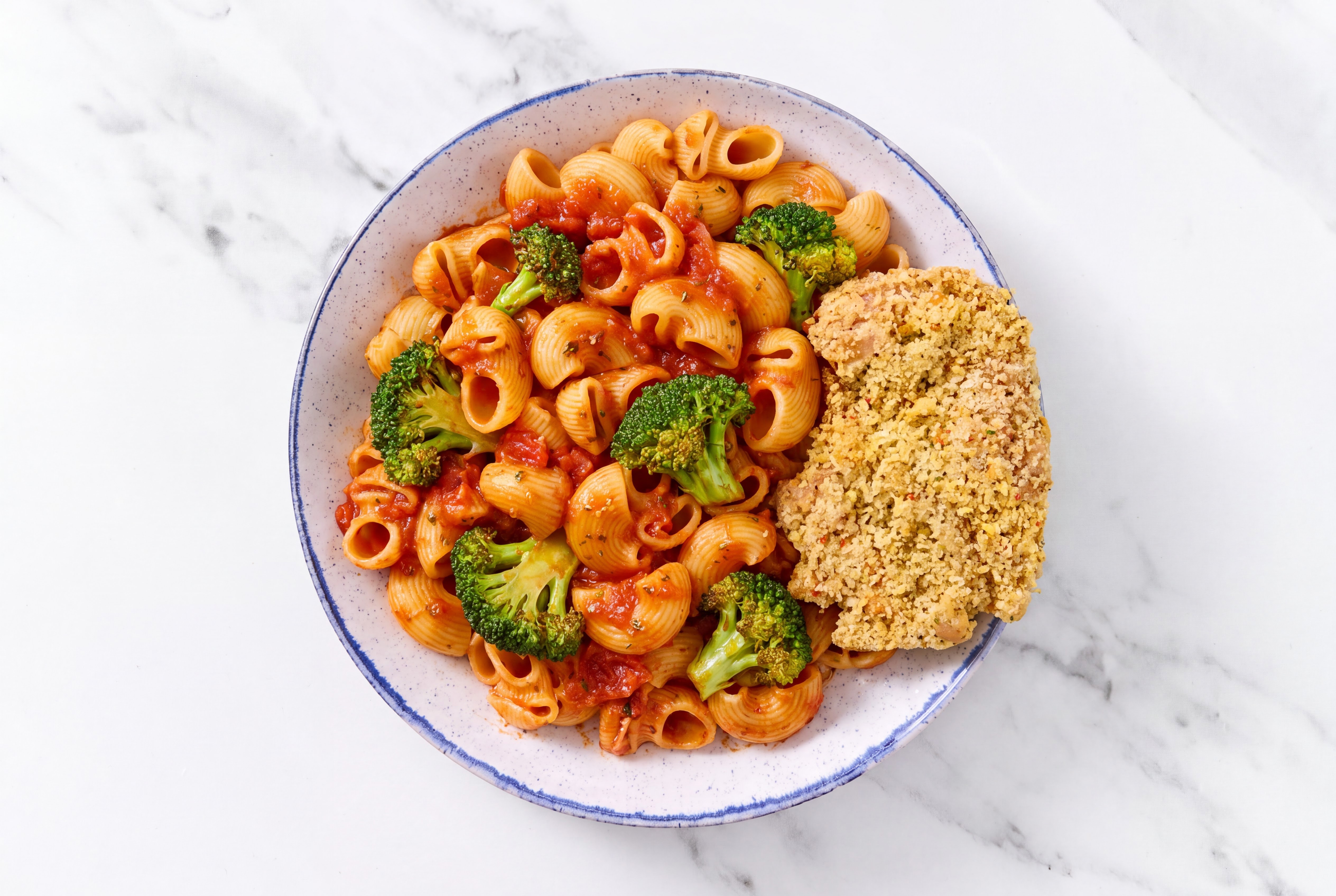 Crispy Garlic Chicken over Marinara Chiocciole Pasta with Broccoli