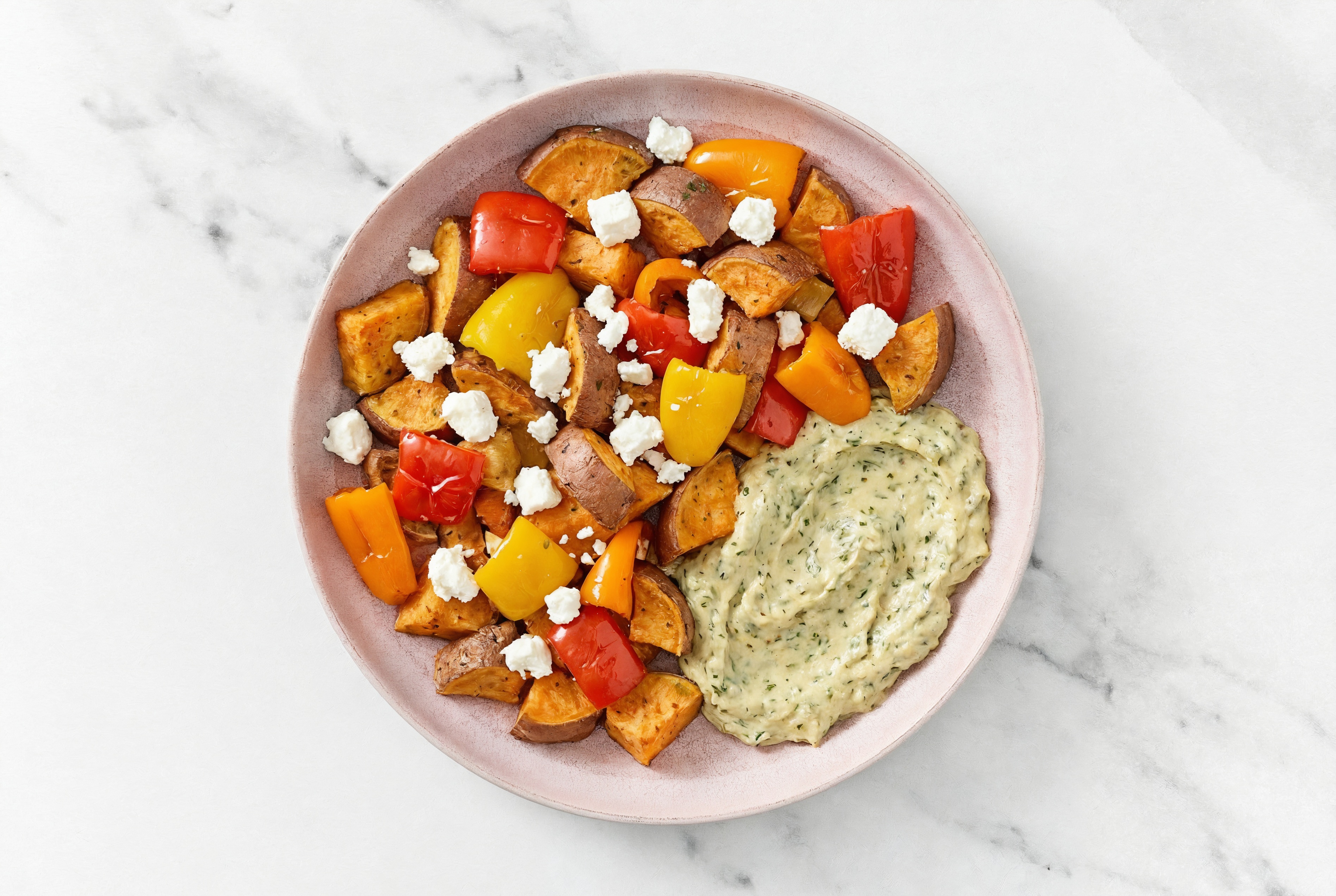 Crumbled Chevre Sweet Pepper Sweet Potato Bowl over Spinach Artichoke Dip