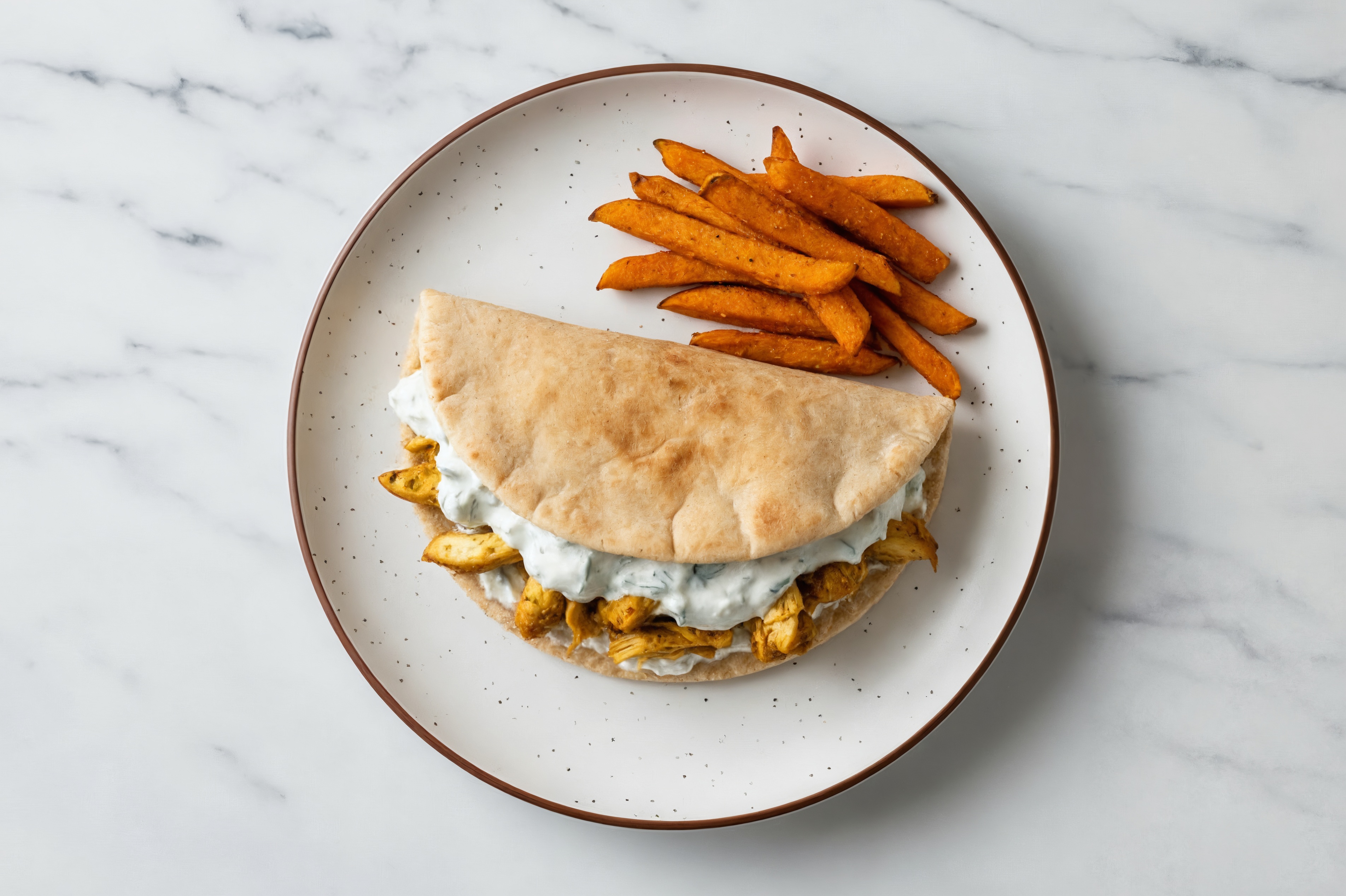 Shawarma Chicken Whole Grain Pita Pockets with Sweet Potato Fries
