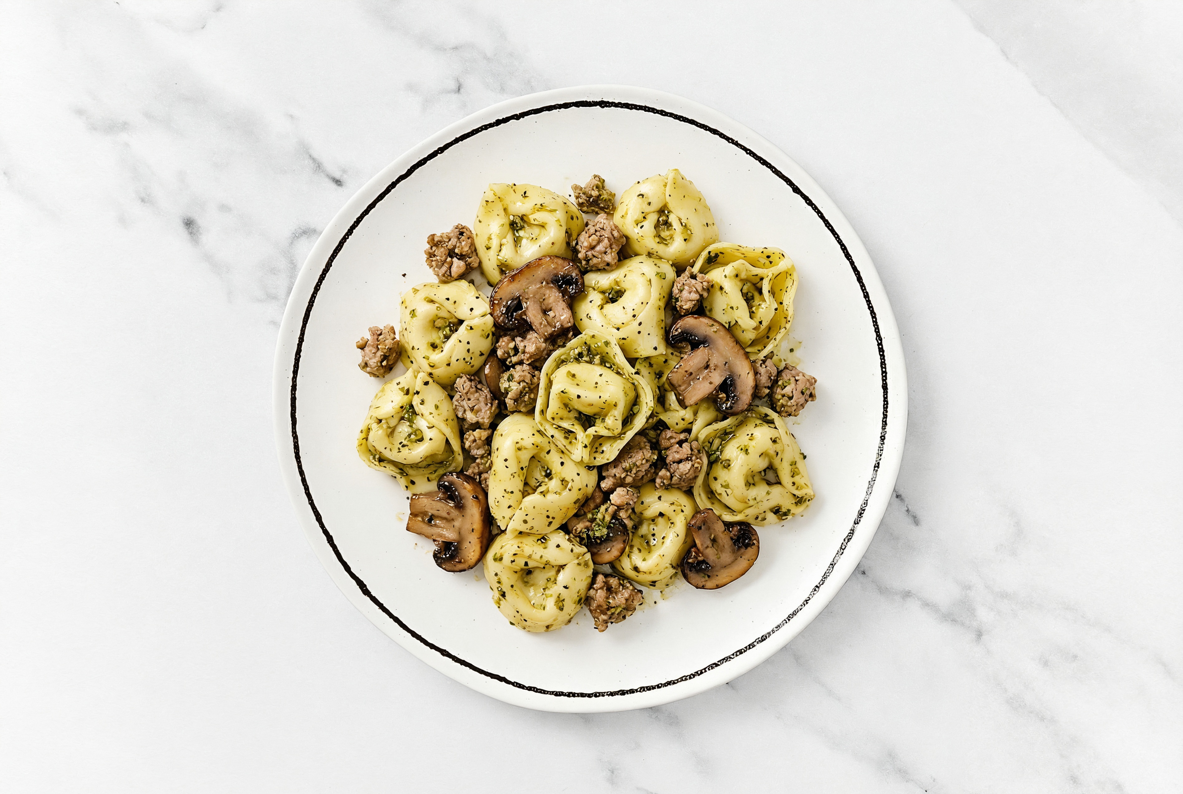 Four Cheese Tortelloni Pesto with Ground Lamb & Mushrooms