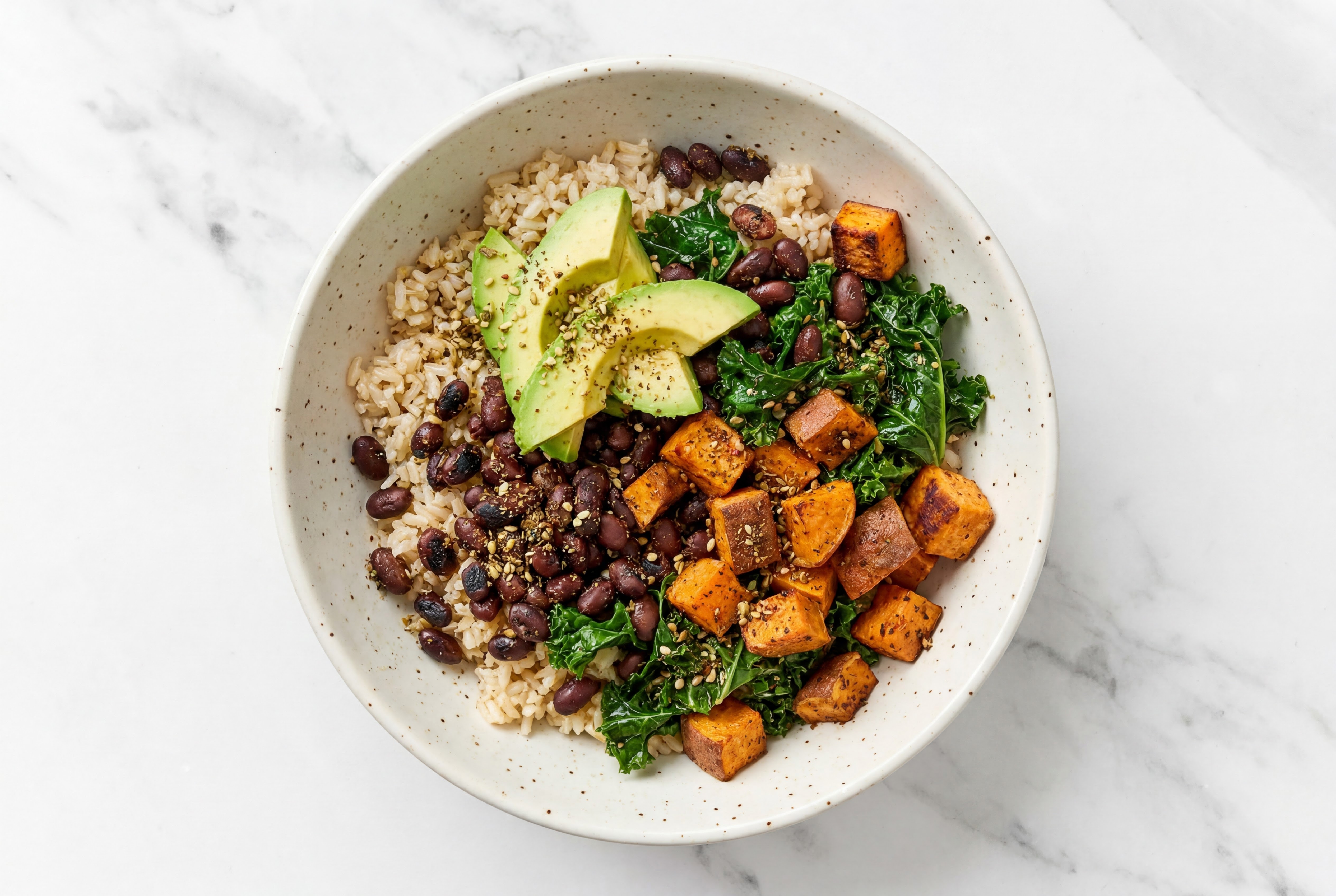 Za'atar Black Bean Japanese Sweet Potato Bowl with Kale + Avocado