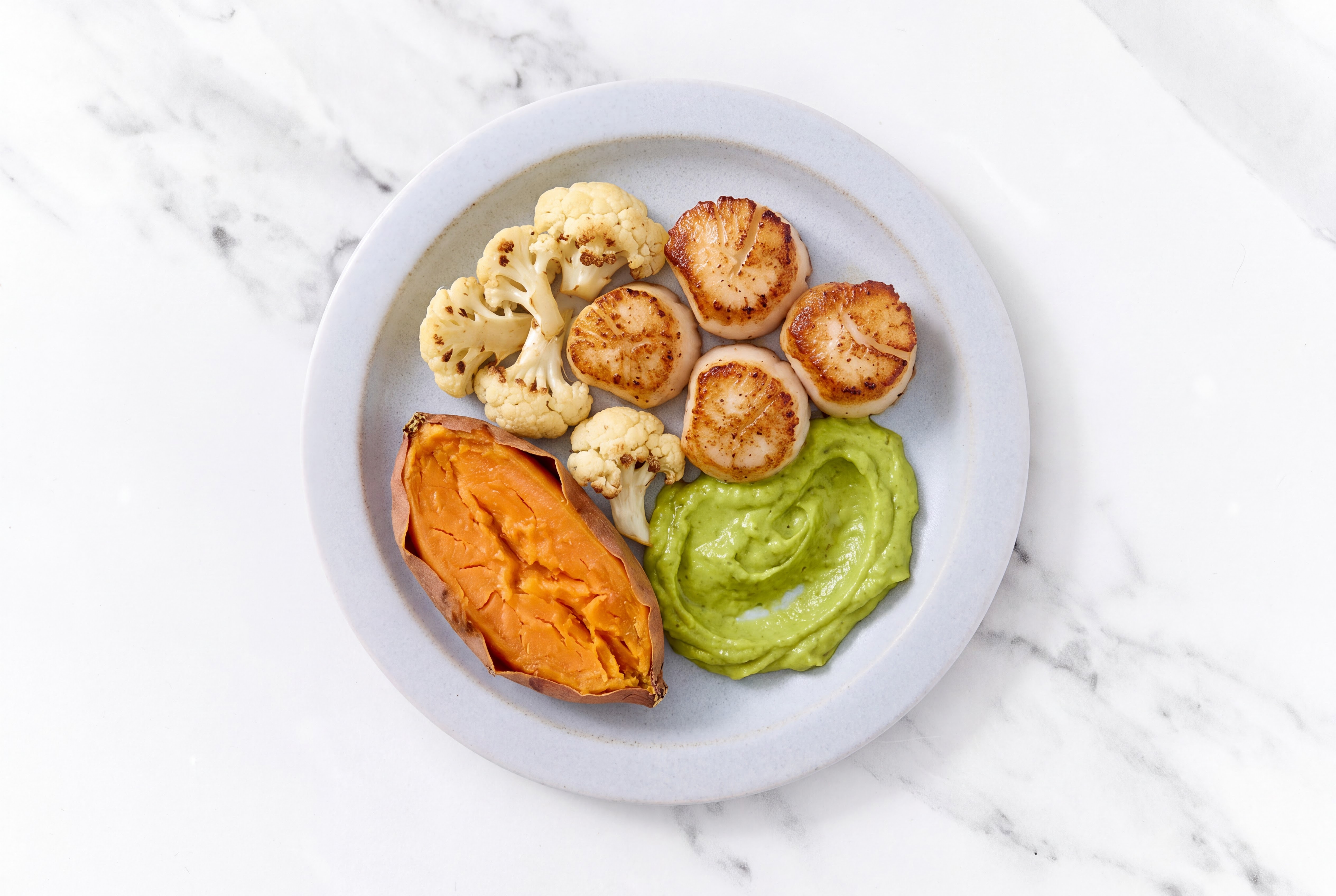 Avocado Wild Jumbo Scallops with Sweet Potato & Cauliflower Florets