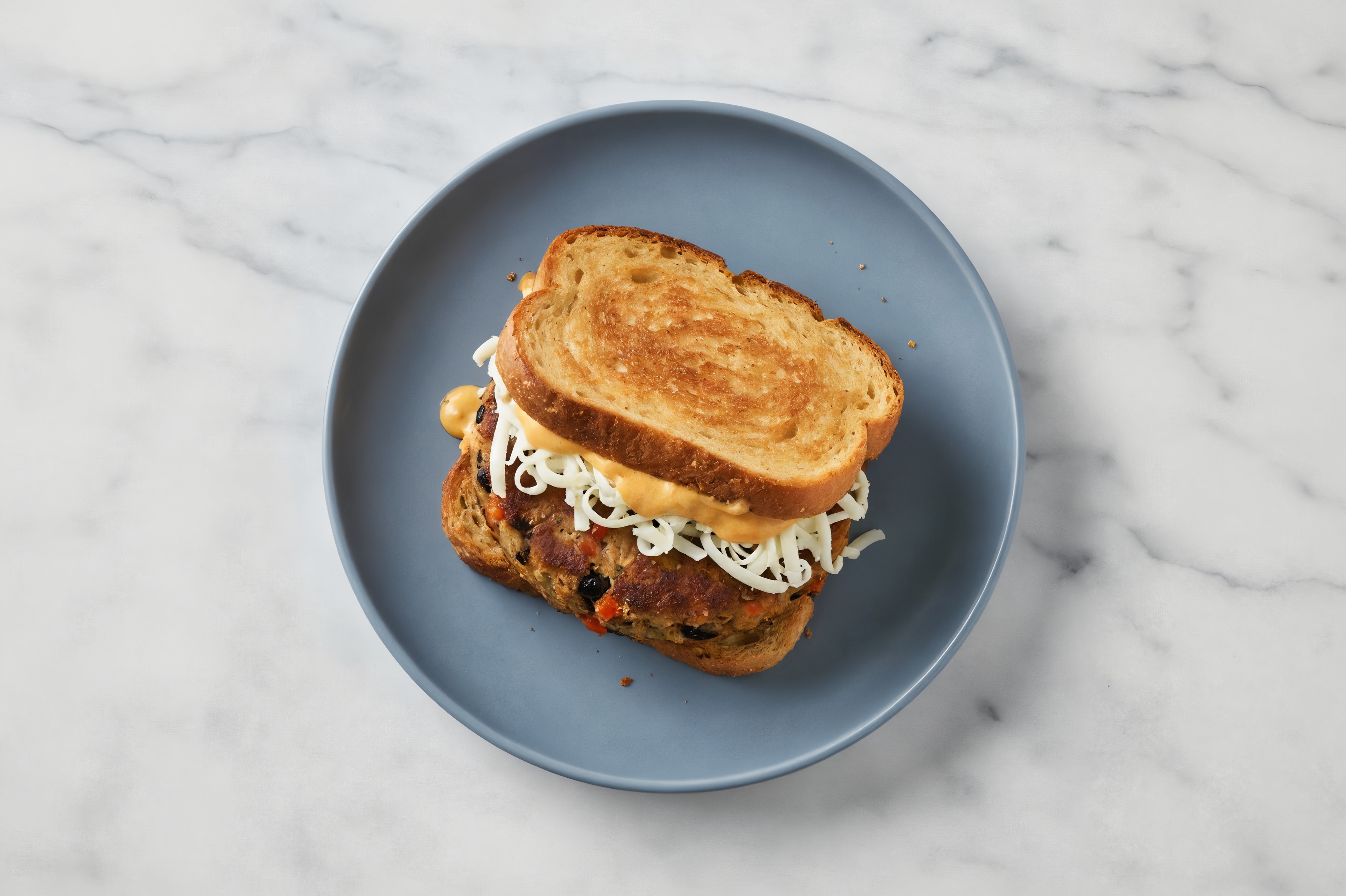 "Mozzarella" Black Bean Burger on GF Bread with Special Sauce
