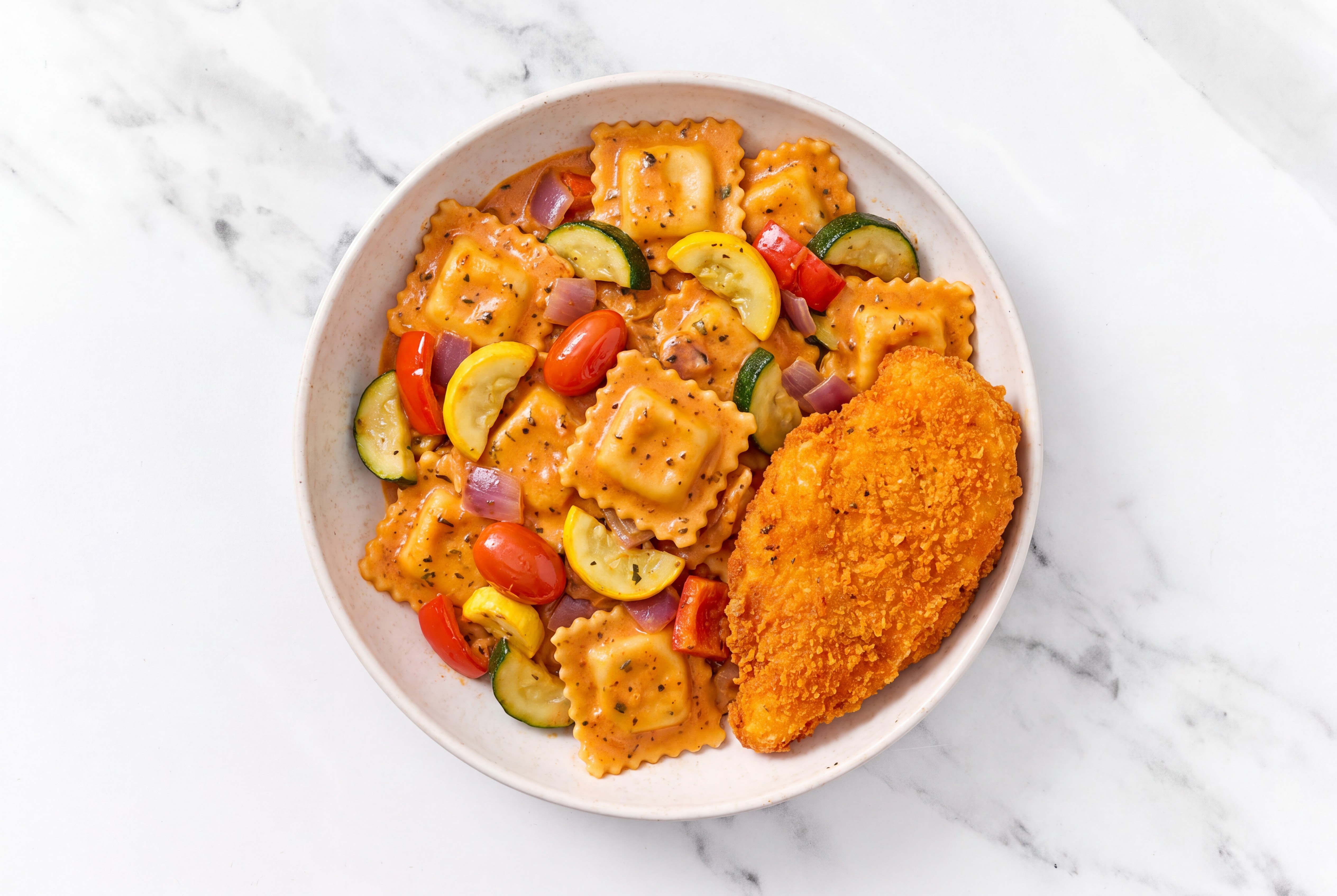 Crispy Hot Honey Chicken over Creamy Vodka Ravioli with Mixed Veggies