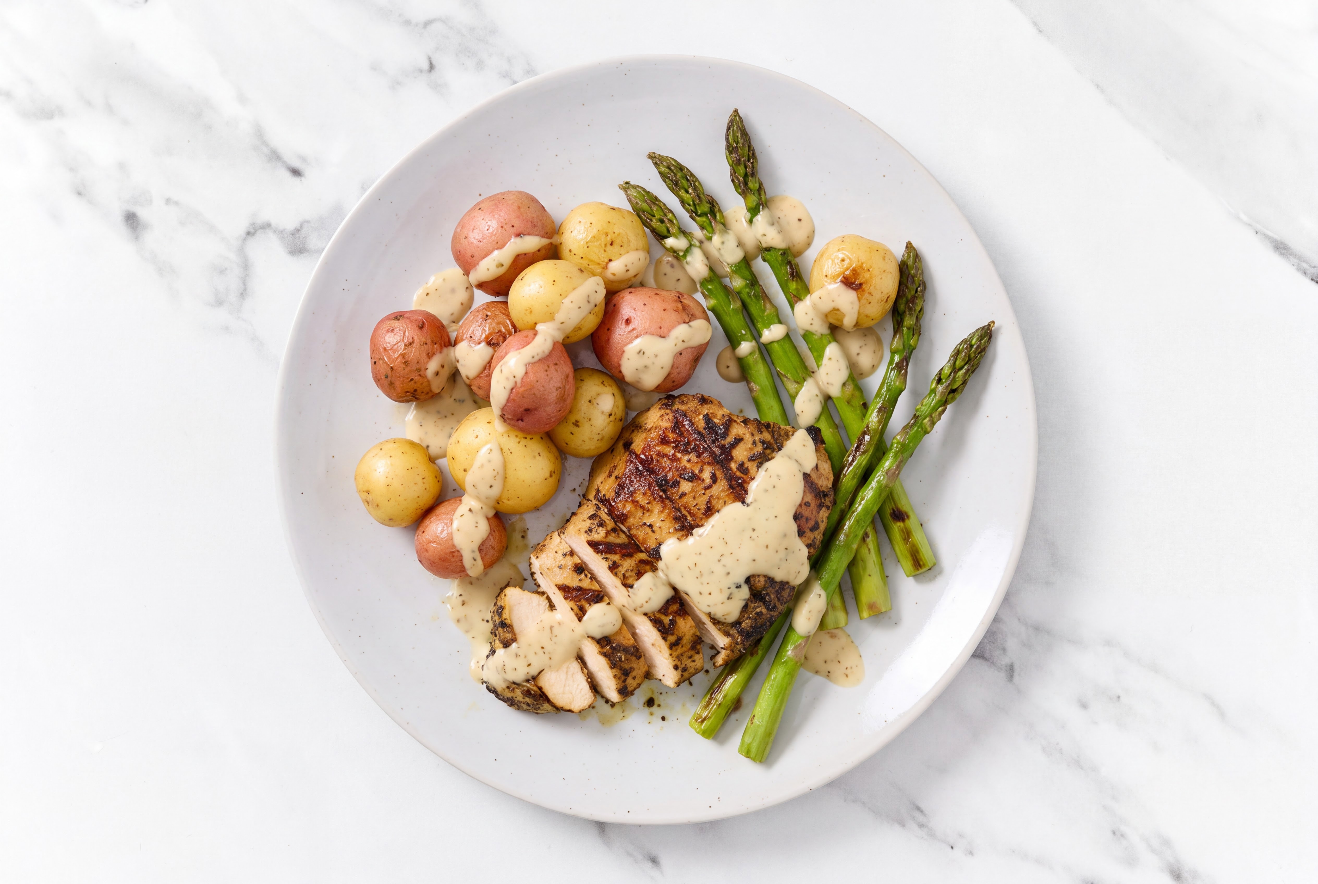 Grilled Mediterranean Chicken Breast with Crispy Potatoes + Asparagus