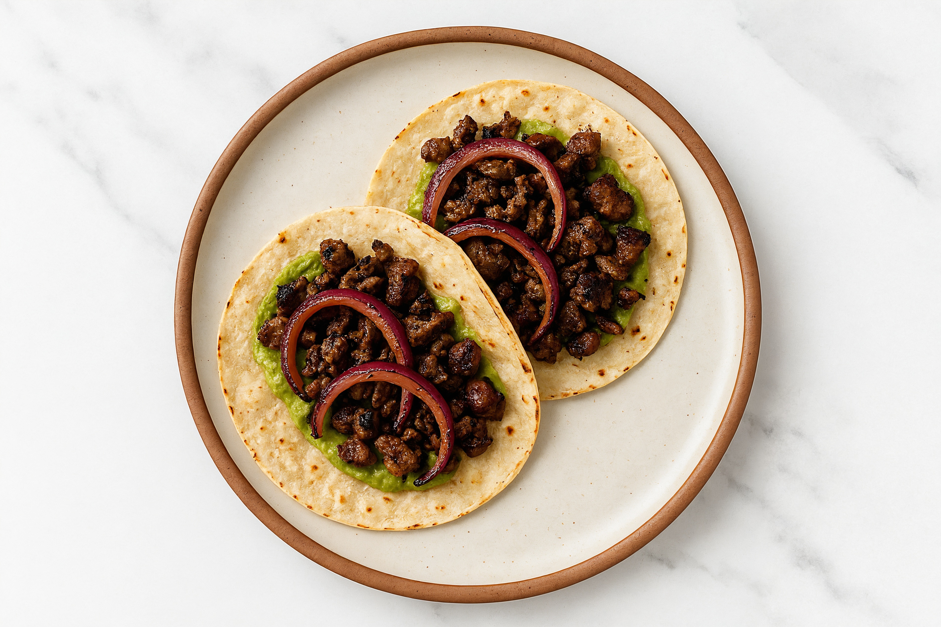 Wagyu Beef 'n Onion Guacamole Tostadas
