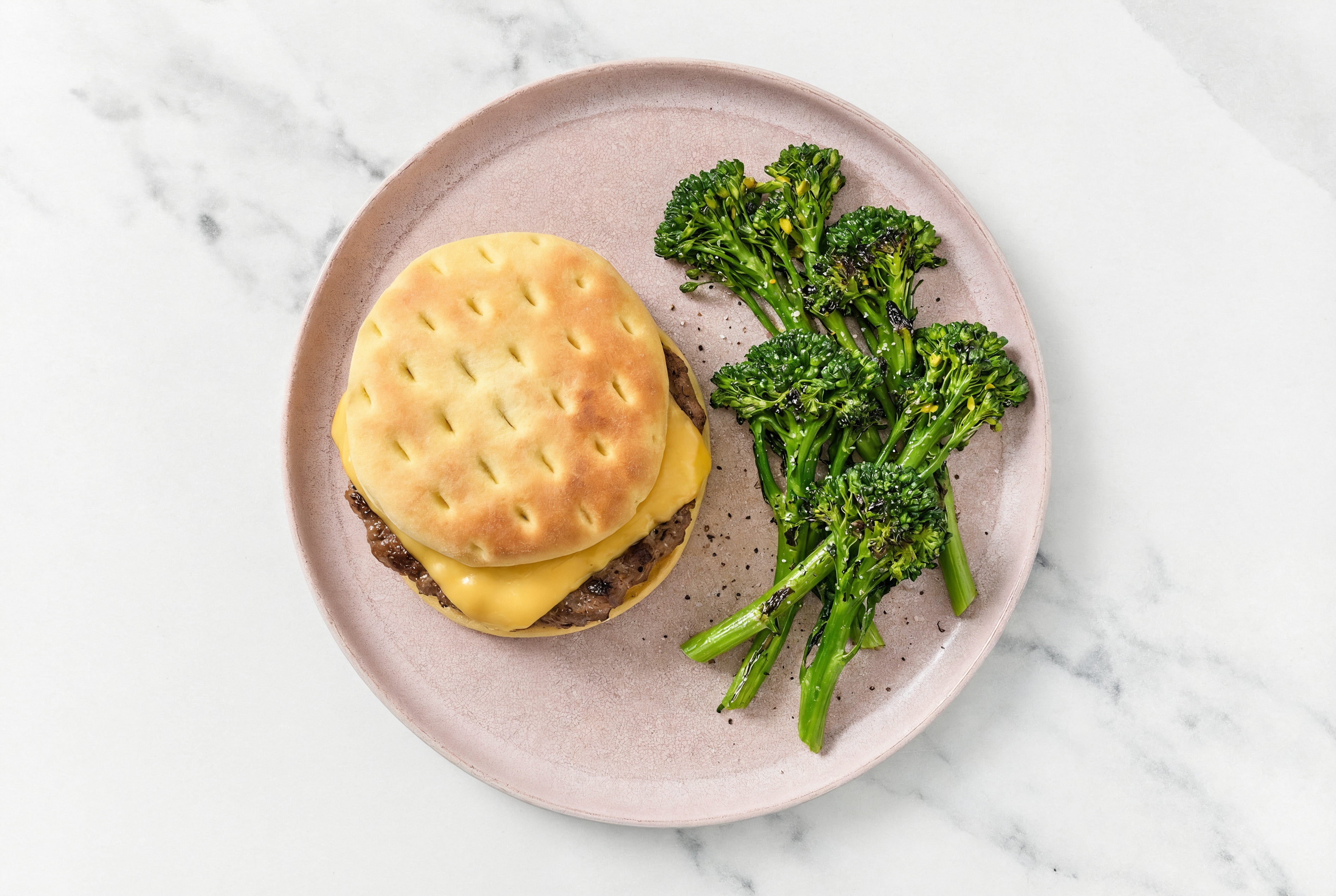 Cheesy Tavern Burger on Brioche with Baby Broccoli