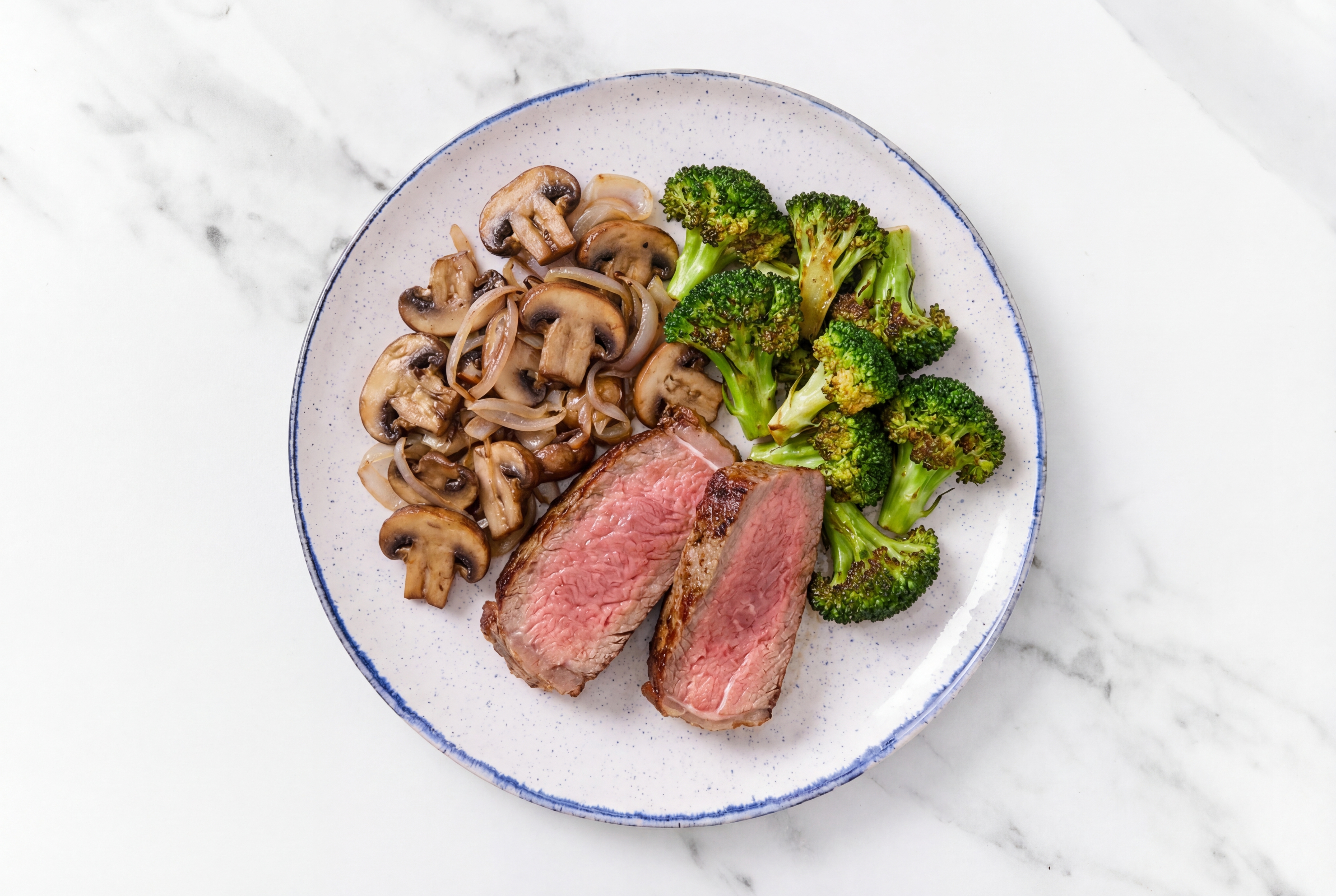 Seared Ribeye Steak with Mushrooms with Broccoli Bunches