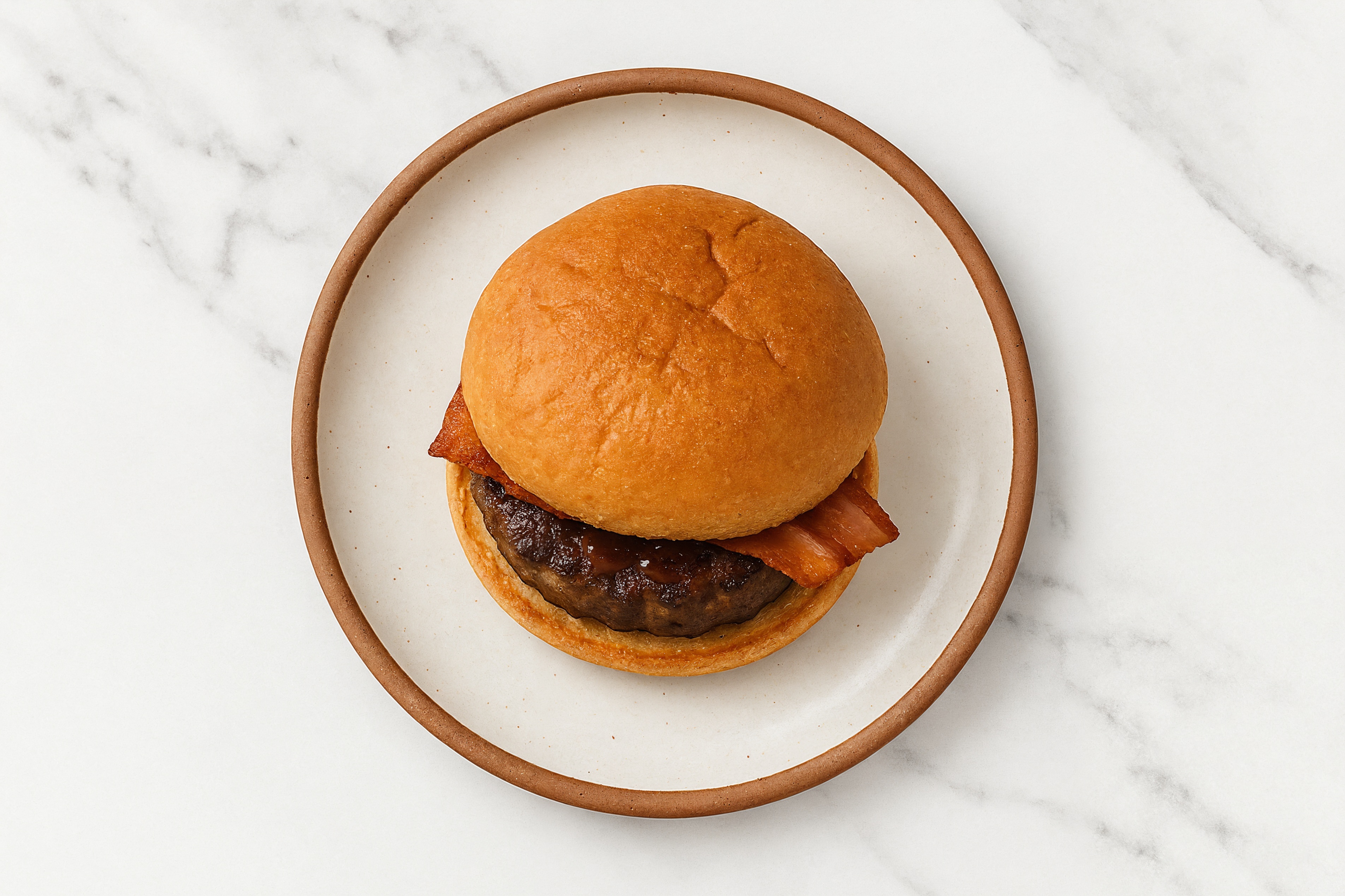 Ground Lamb Burger on Gluten-Free Bun with Black Pepper & Turkey Bacon