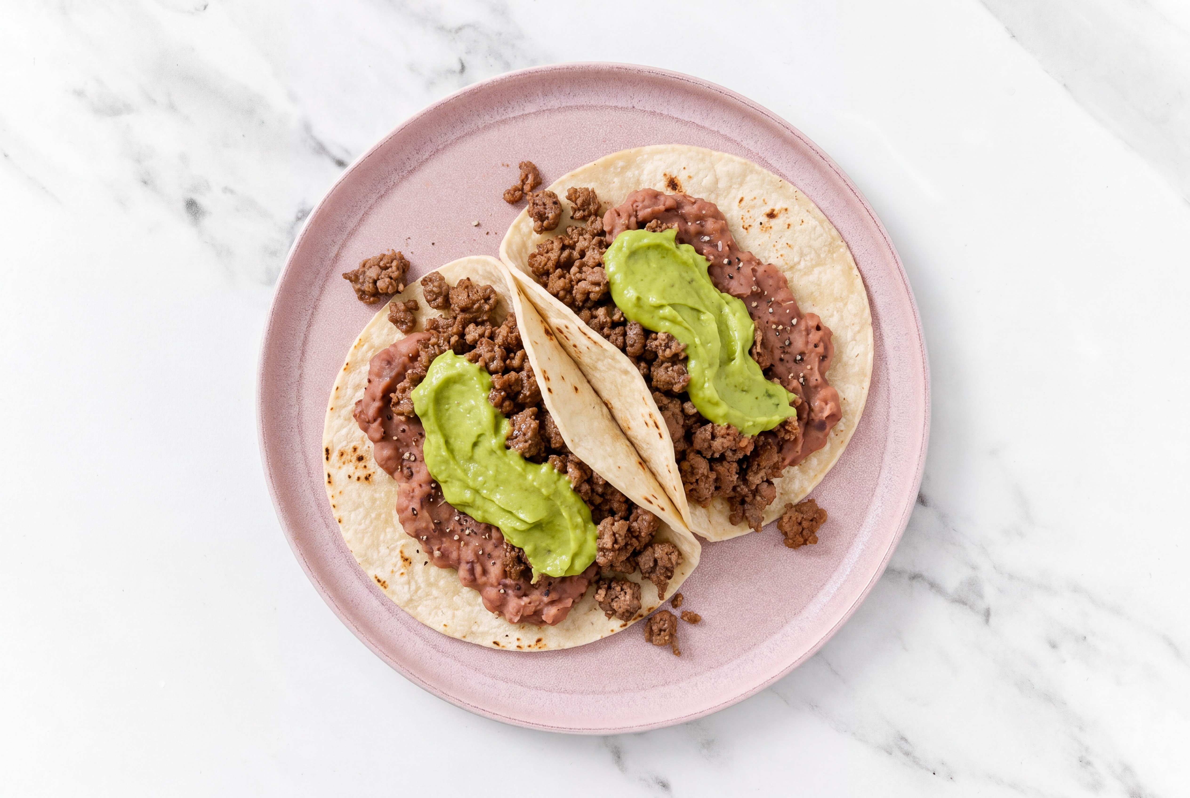 Hearty Ground 93/7 Lean Beef Tacos with Avocado & Refried Red Beans