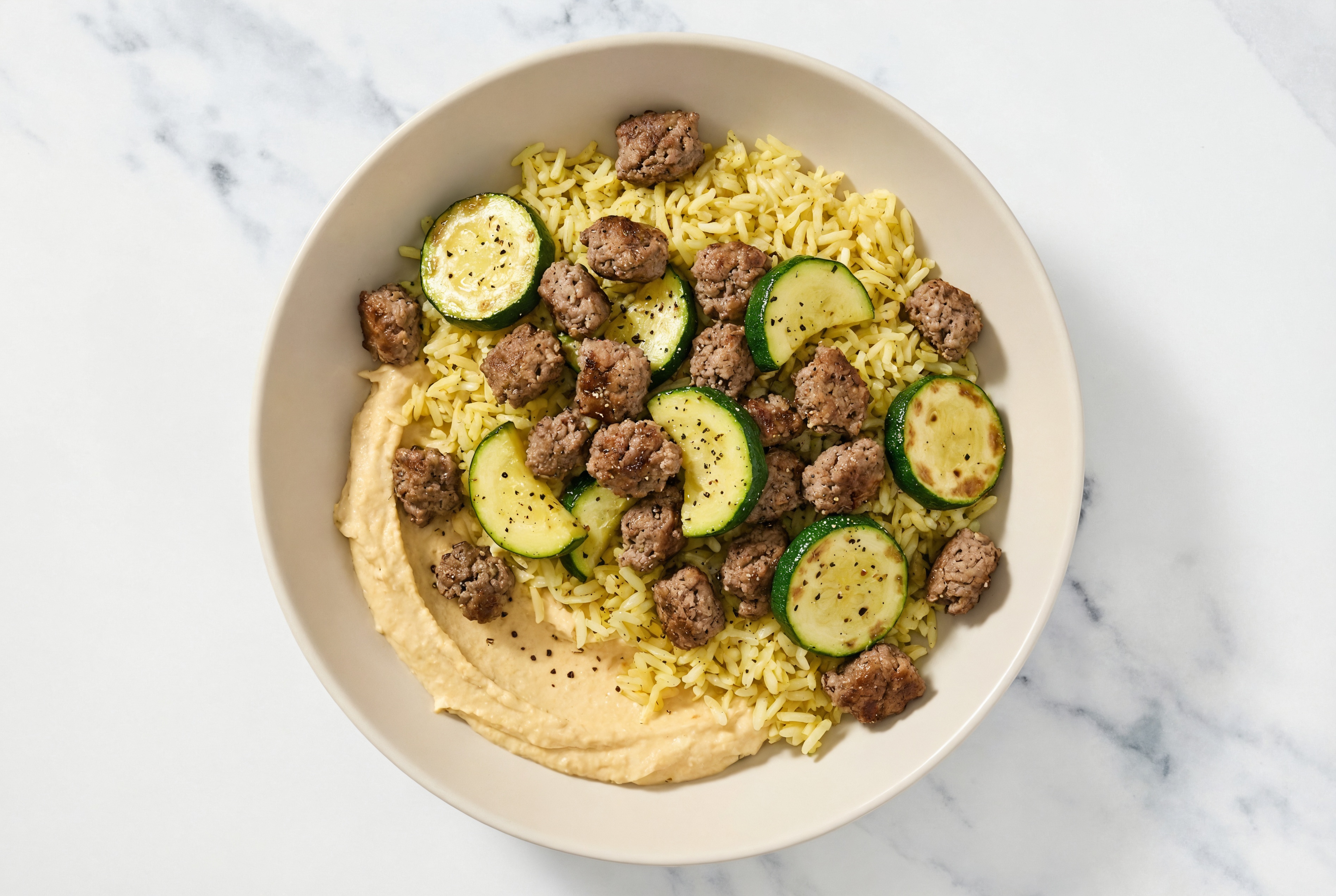 Ground Bison & Zucchini Grain Bowl with Onion Hummus