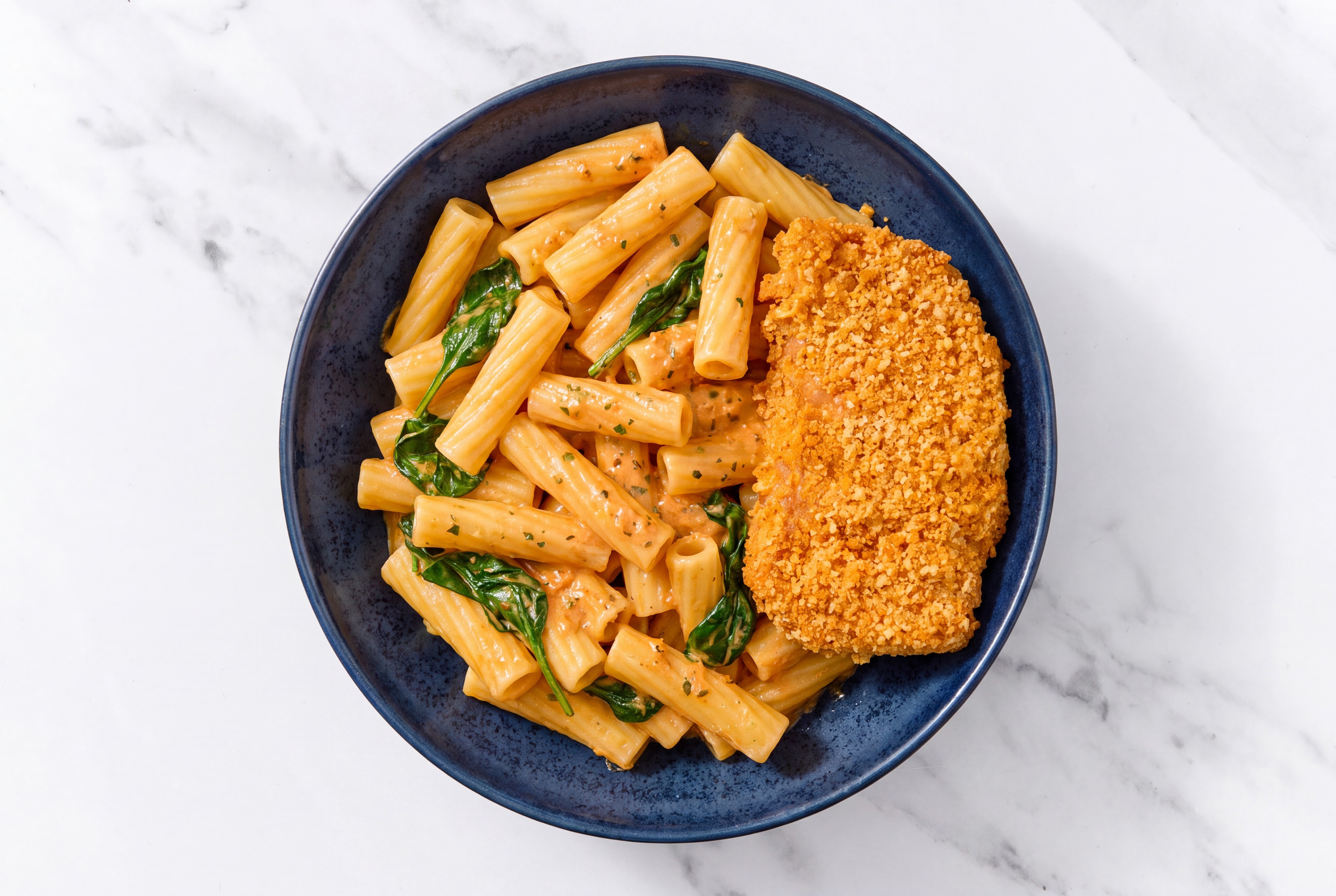 Crispy Hot Honey Chicken over Creamy Vodka Rigatoni with Baby Spinach