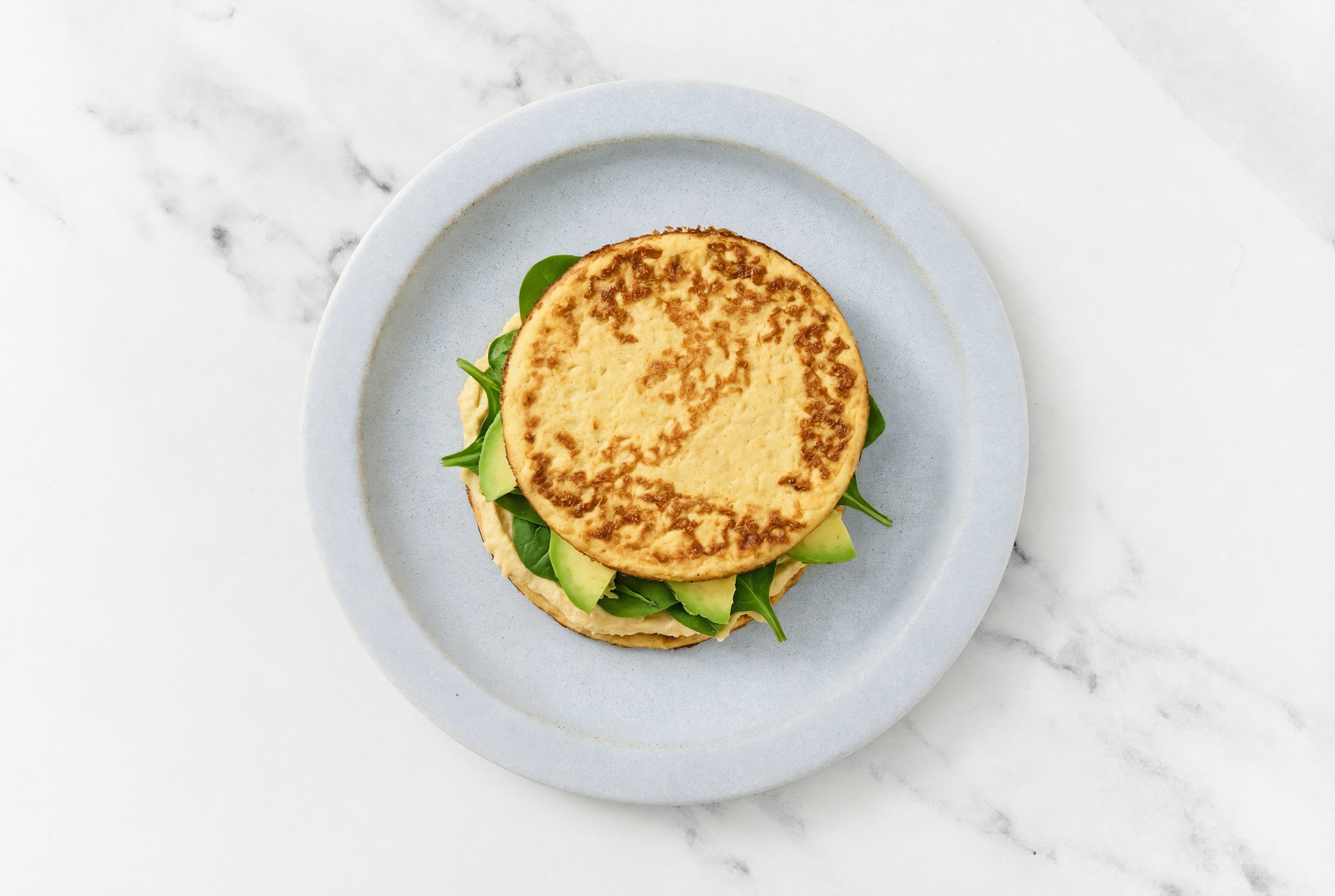 Lemony Olive Oil Sea Salt Hummus + Avo Sandwich on Cauli Thin