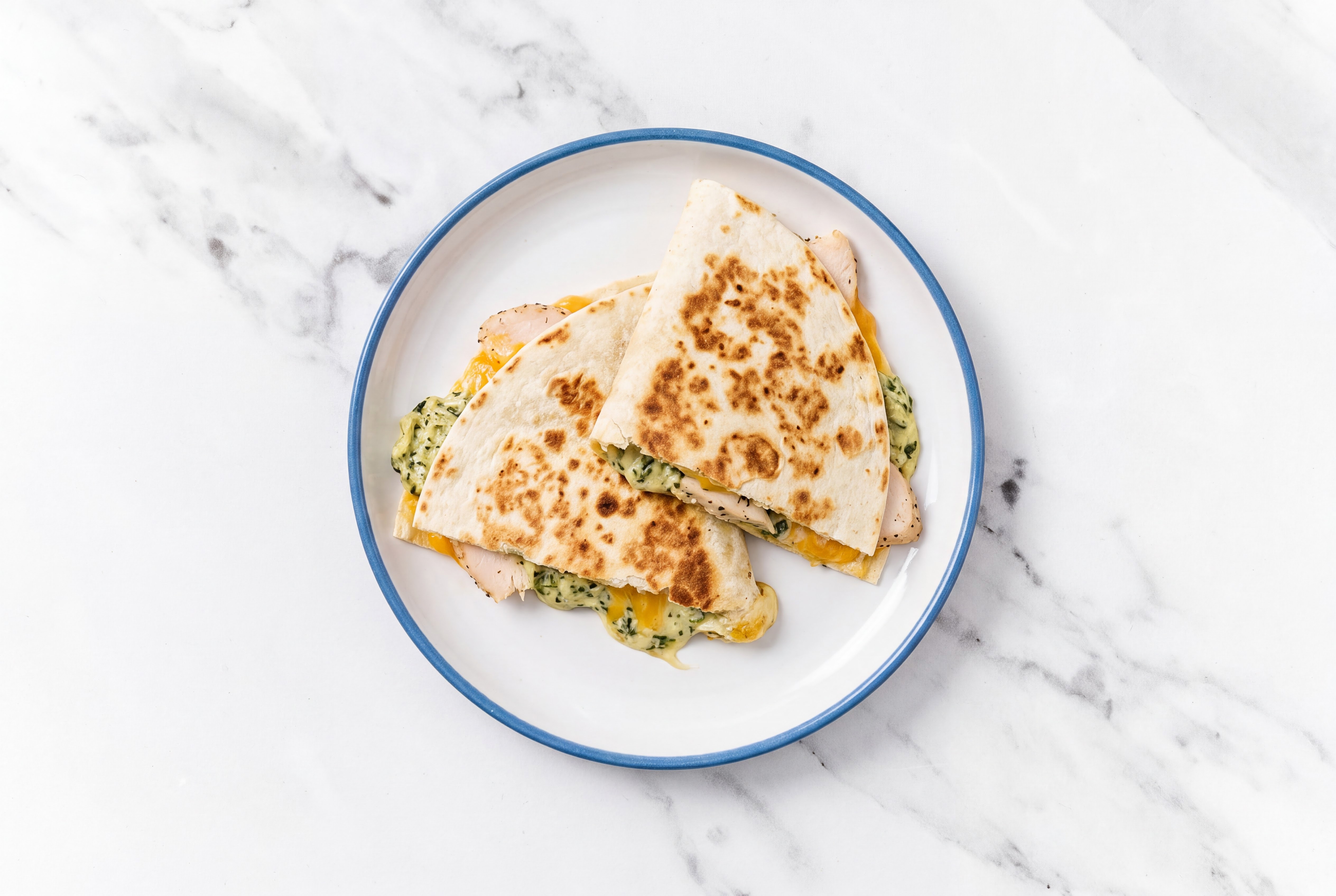 Gooey Spinach Artichoke Roasted Chicken Quesadilla