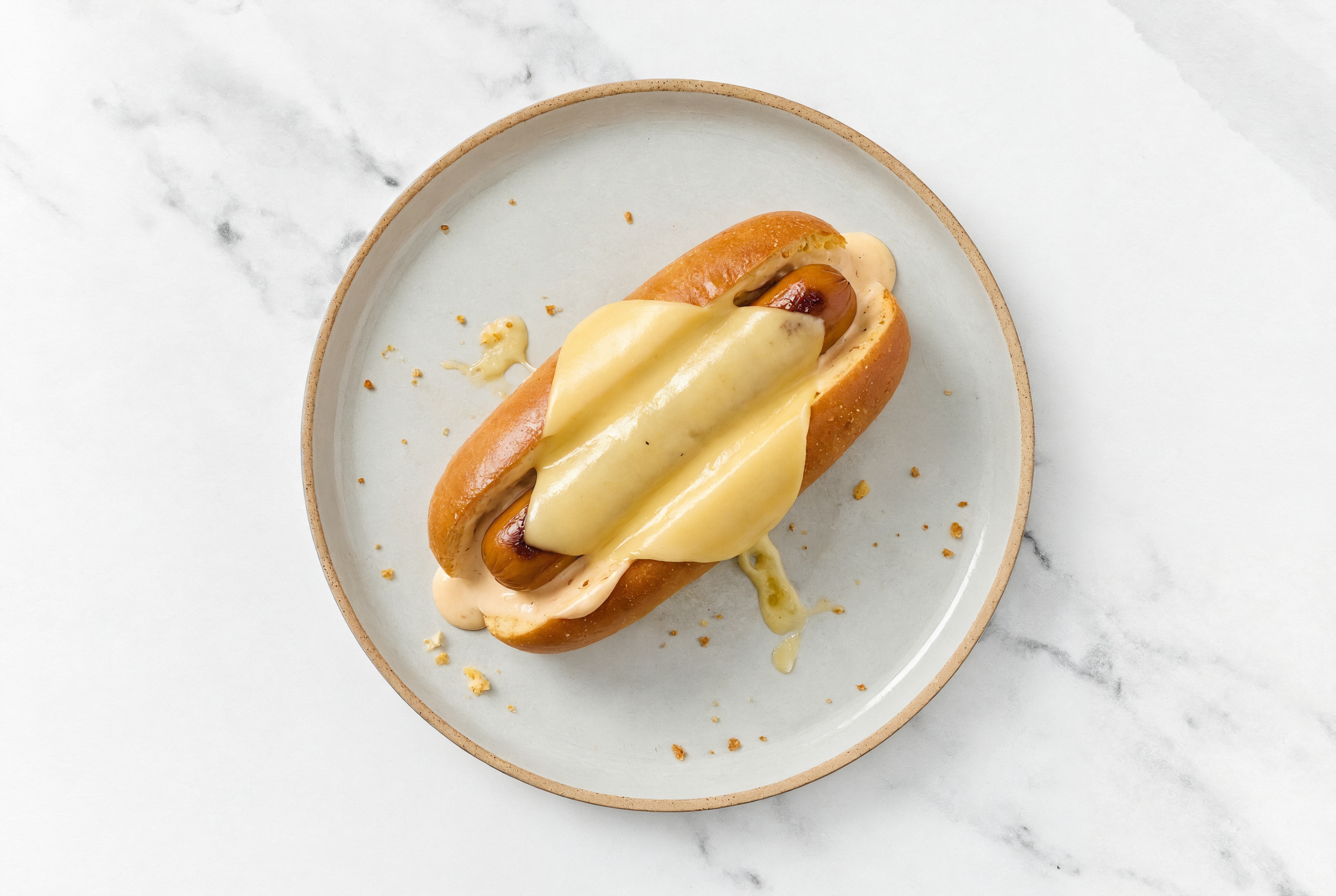 Vegan Cheddar Smart Dog with Awesome Sauce on Brioche