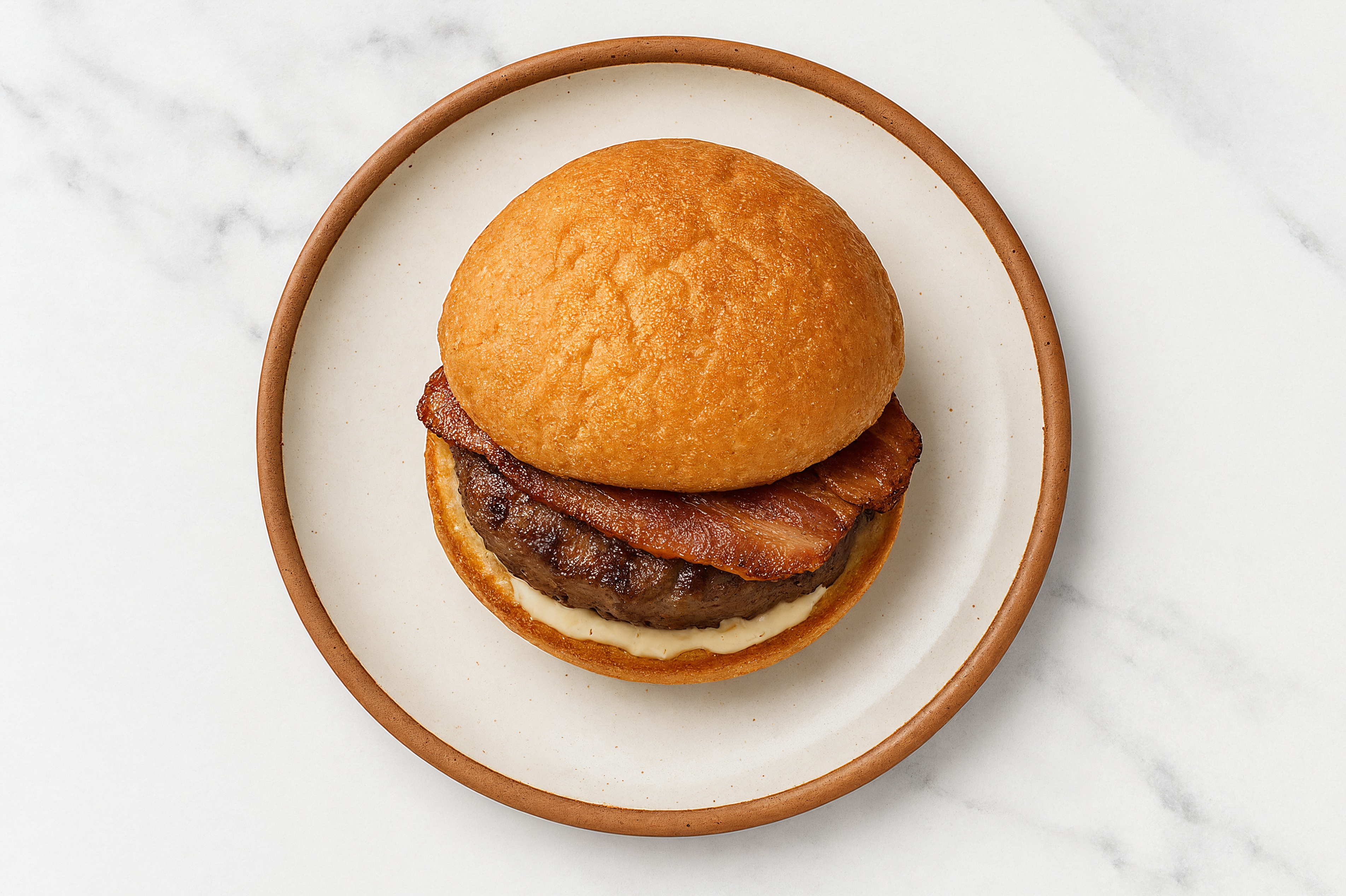 Lamb Burger on Gluten-Free Bun with Garlic Sauce & Turkey Bacon