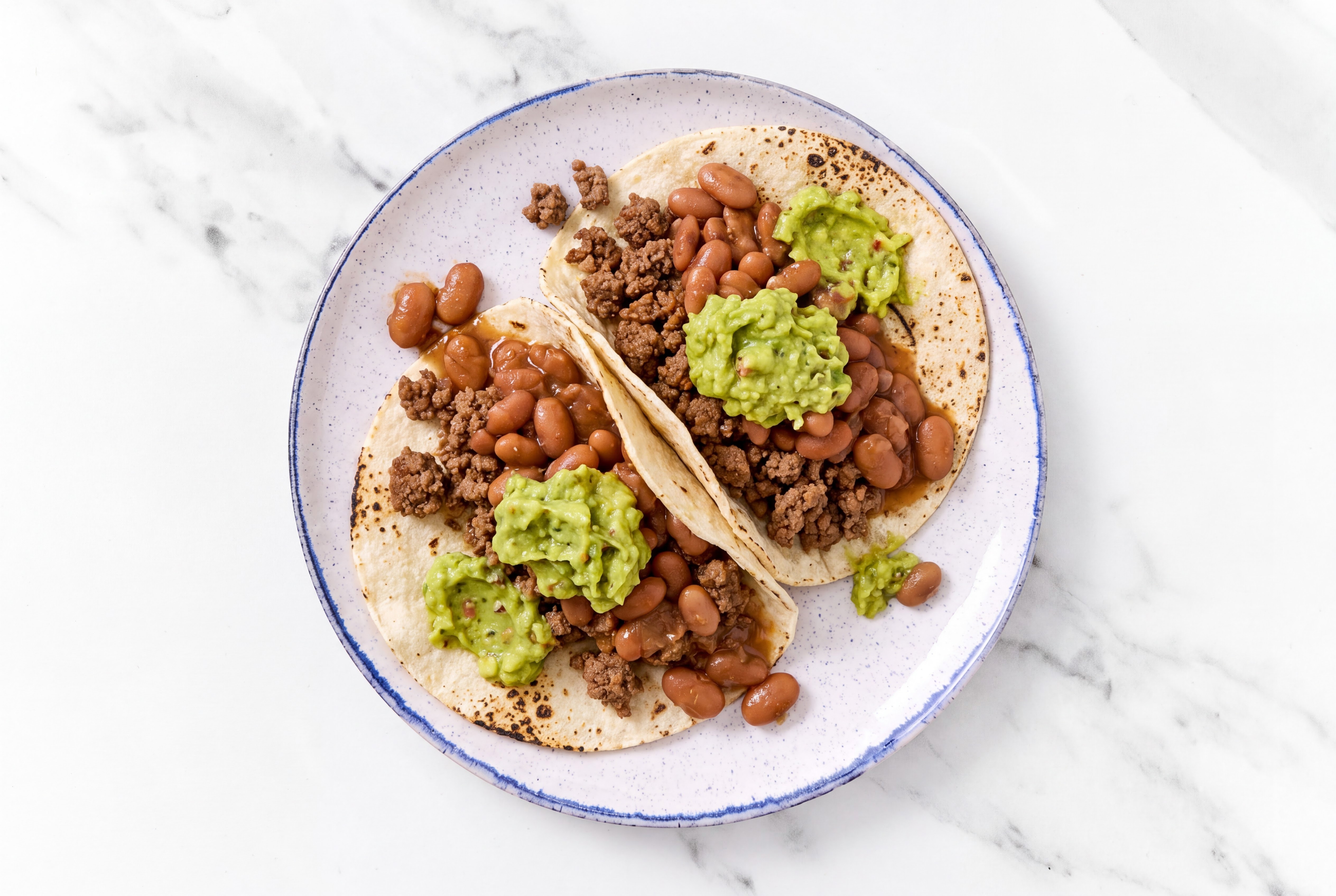 Hearty Ground Beef Tacos with Guacamole & Pinto Beans