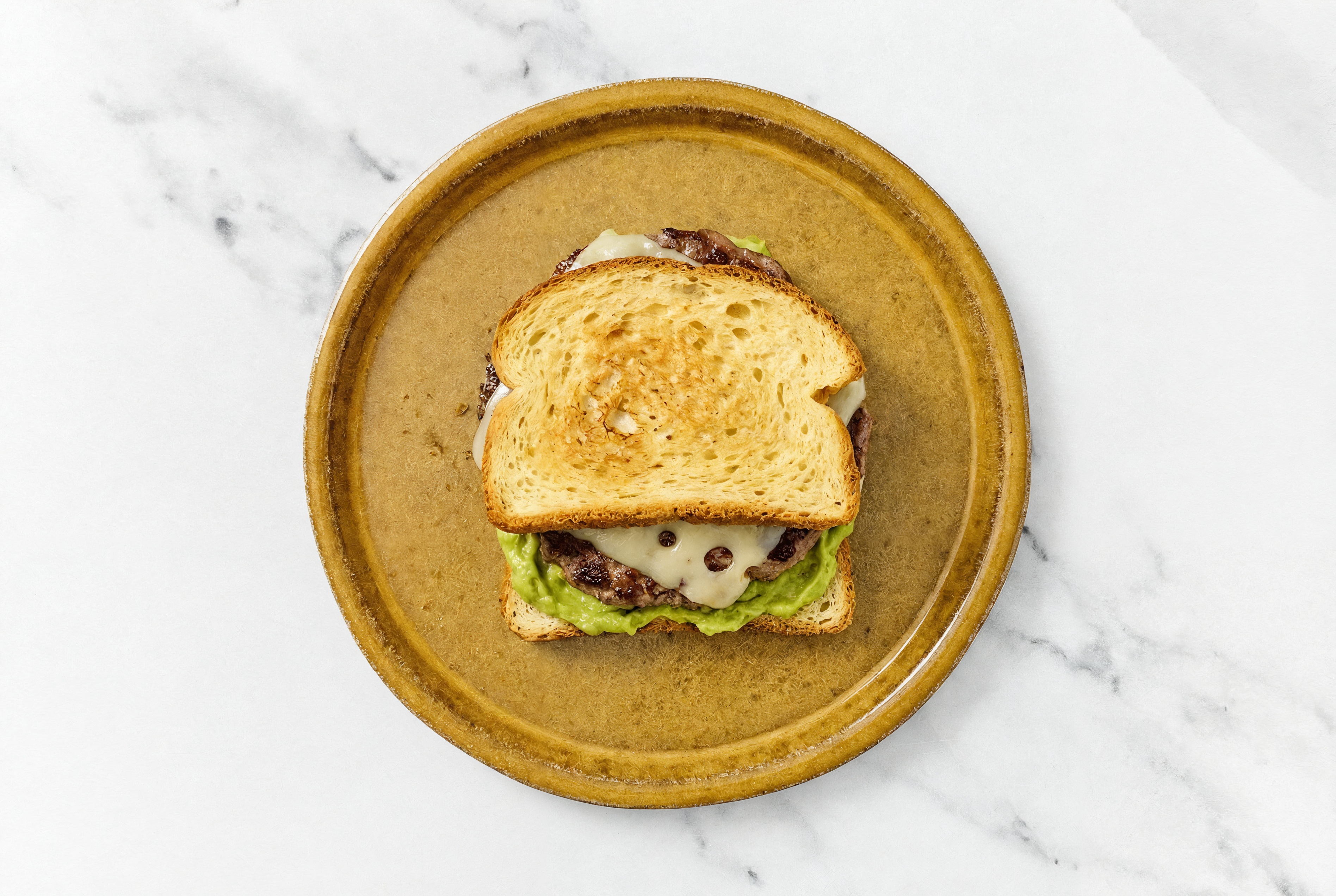 Swiss Wagyu Beef Burger on GF Bread with Guacamole