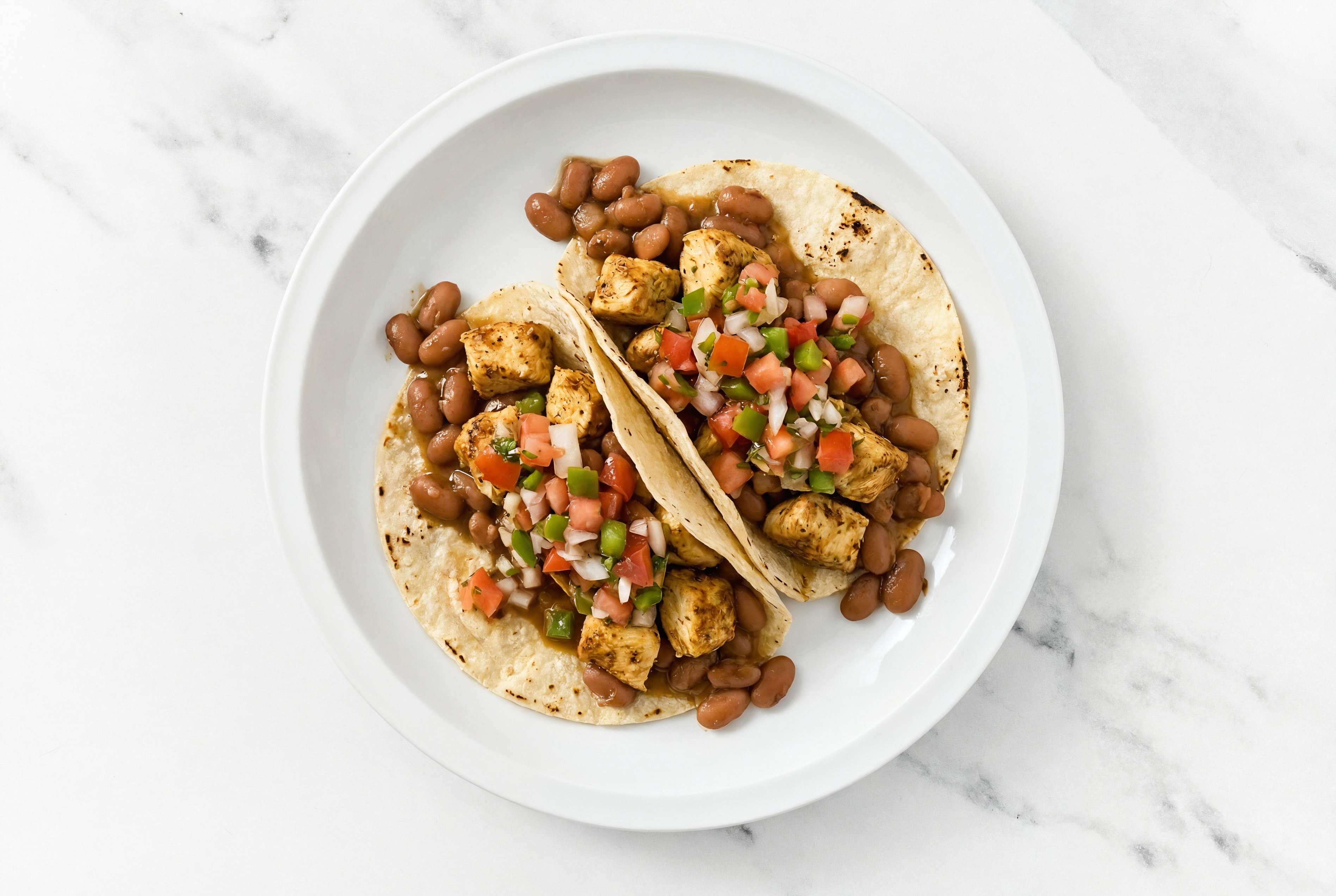 Hearty Garlic Chicken Tacos with Fresh Salsa & Pinto Beans