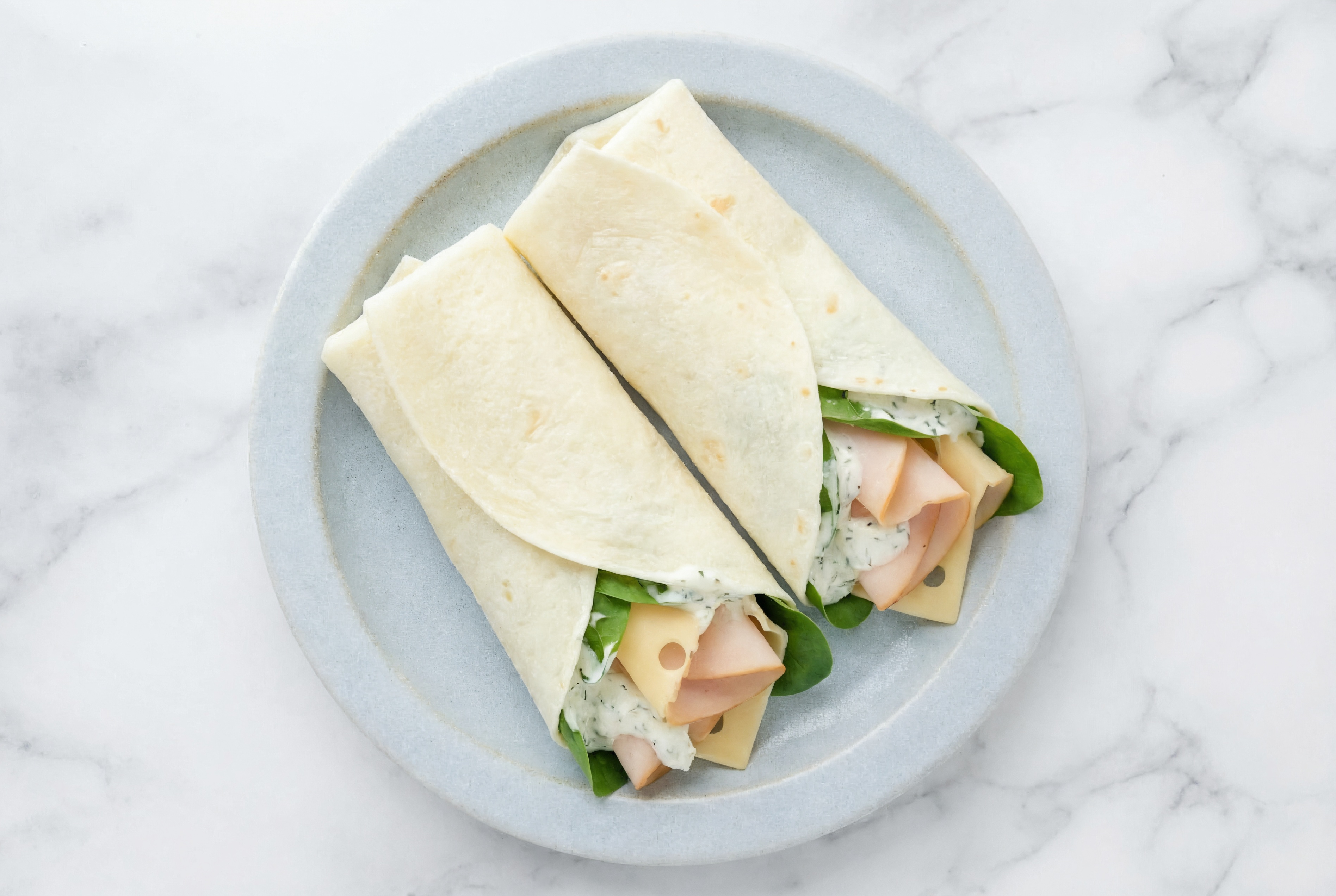 Creamy Oven Roasted Breast Turkey + Swiss Wraps with Spinach