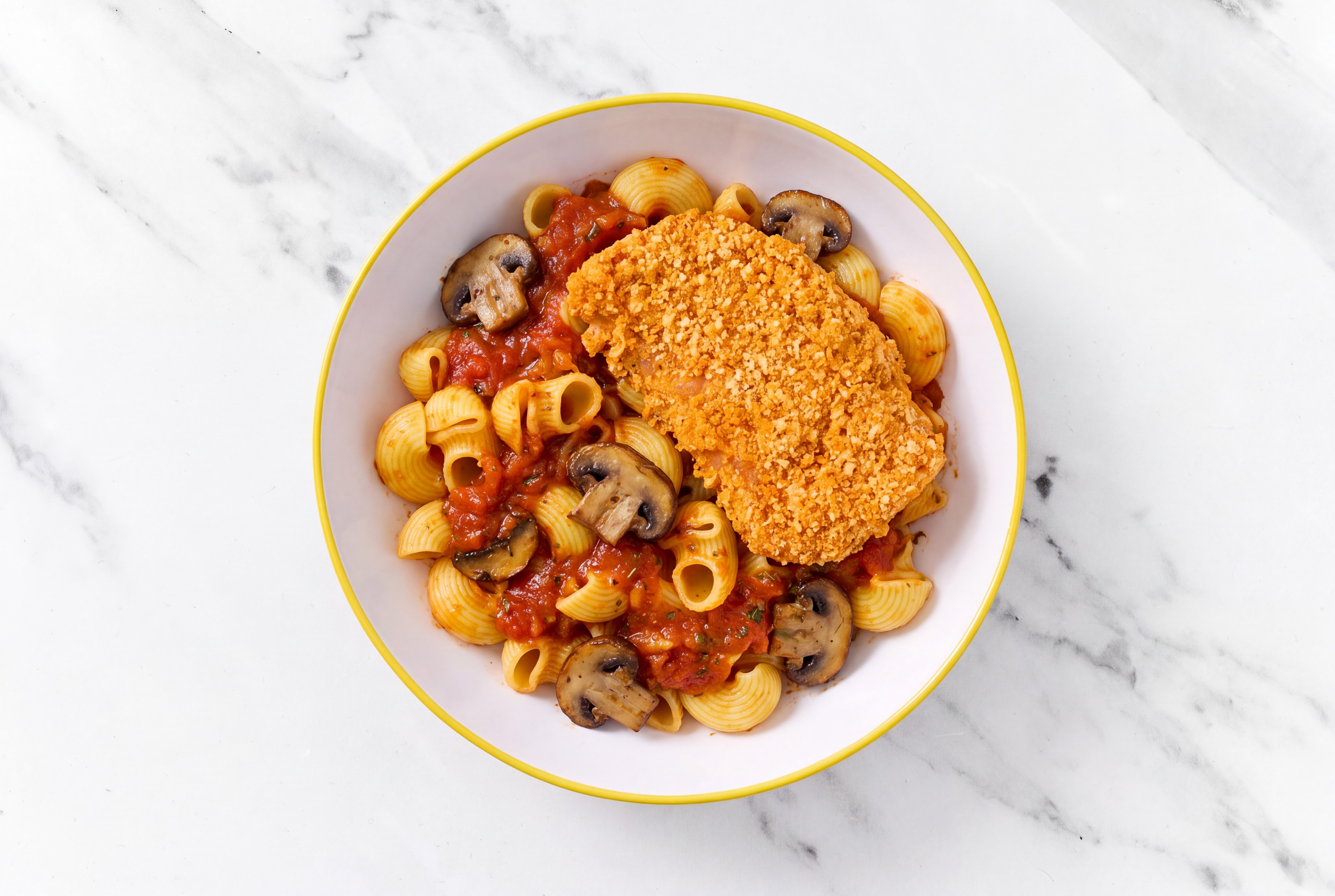 Crispy Hot Honey Chicken over Marinara Chiocciole Pasta with Baby Bella Mushrooms