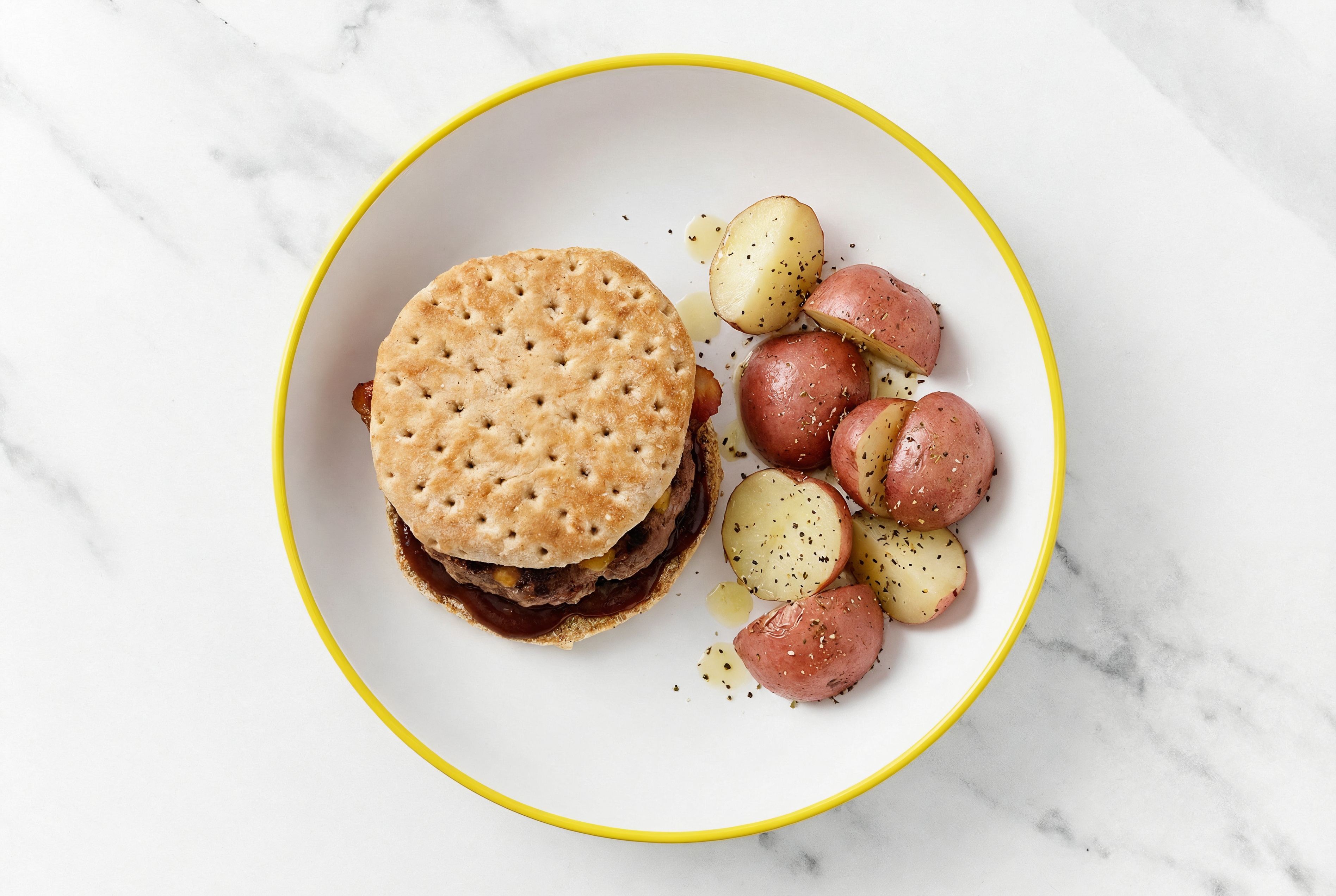 Rustic BBQ Bacon + Cheddar Burger with Red Potatoes
