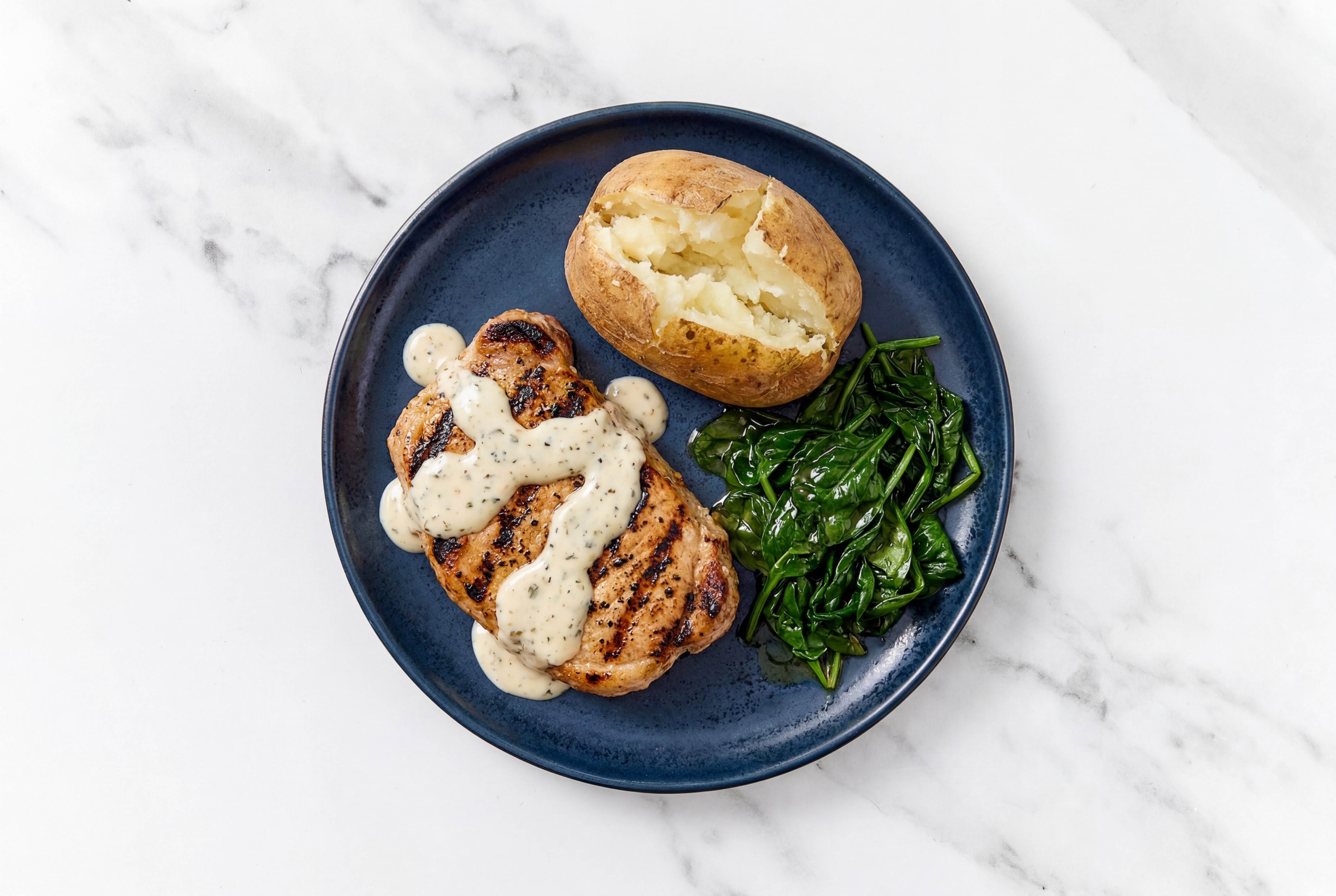 Garlic-Infused Pork Loin with Spinach + Roasted Russet Potatoes