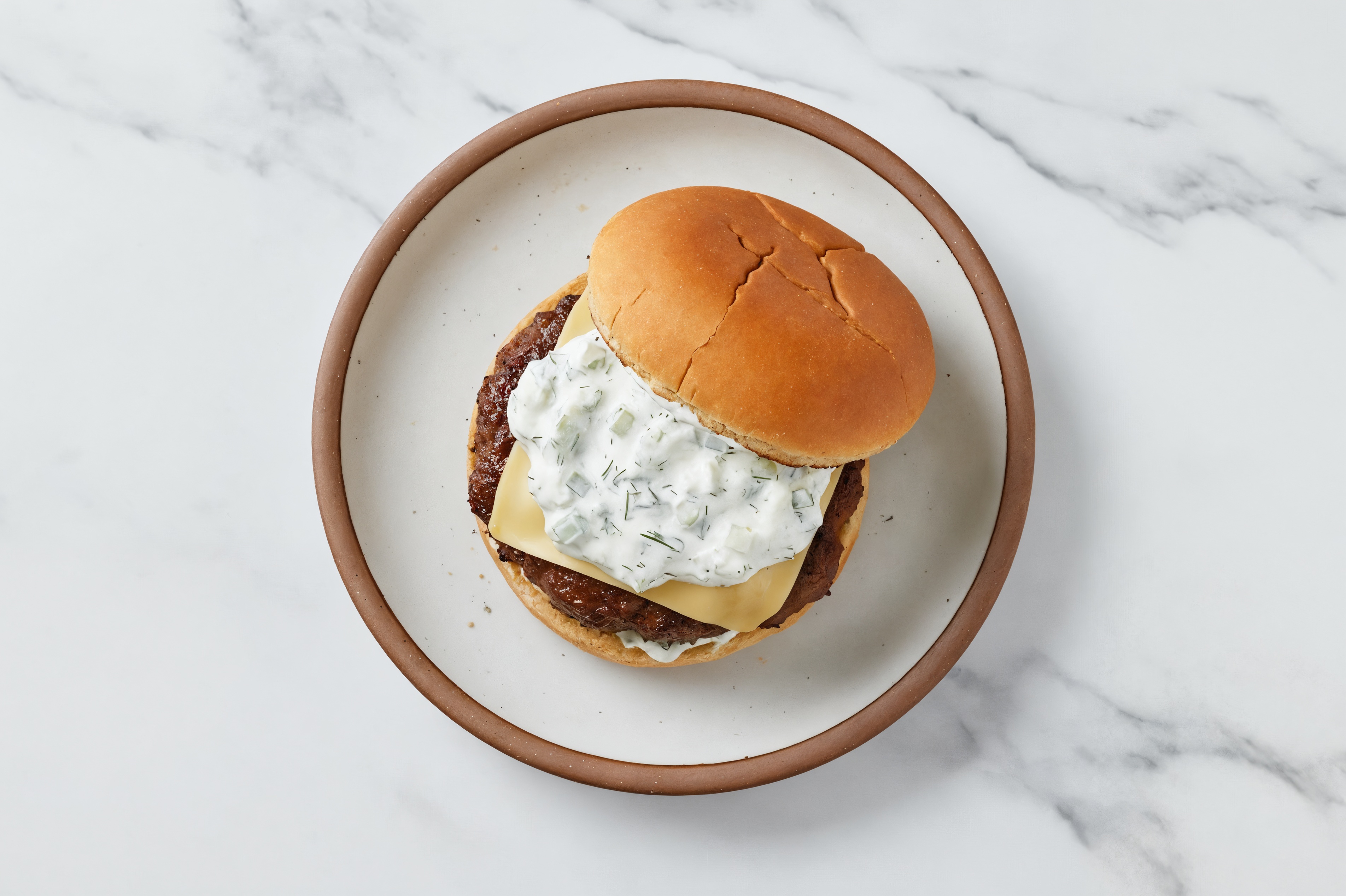Bison Burger on Gluten-Free Bun with Tzatziki & Havarti