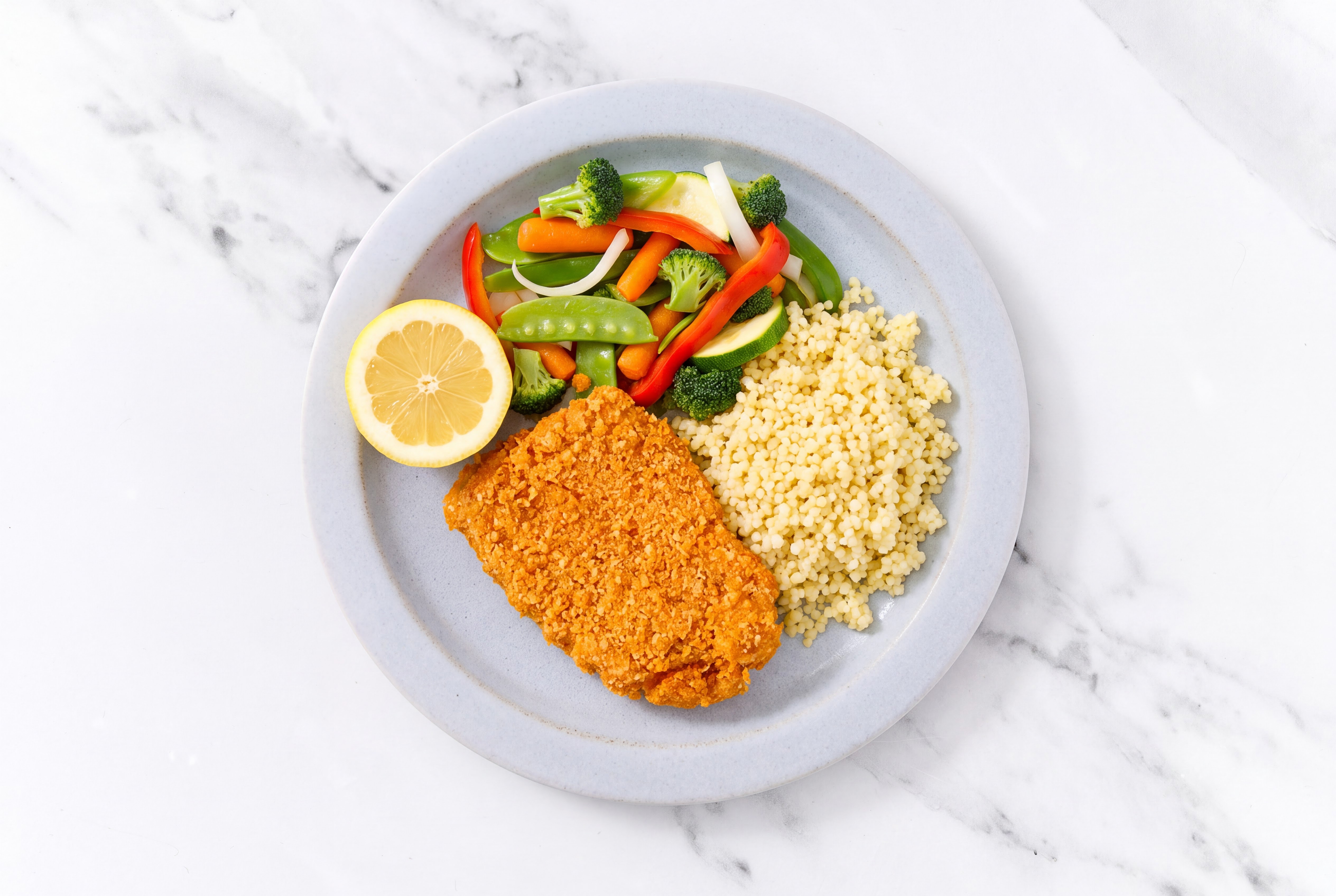 Lemon Hot Honey Breaded Chicken Cutlet with Mixed Veggies & Couscous
