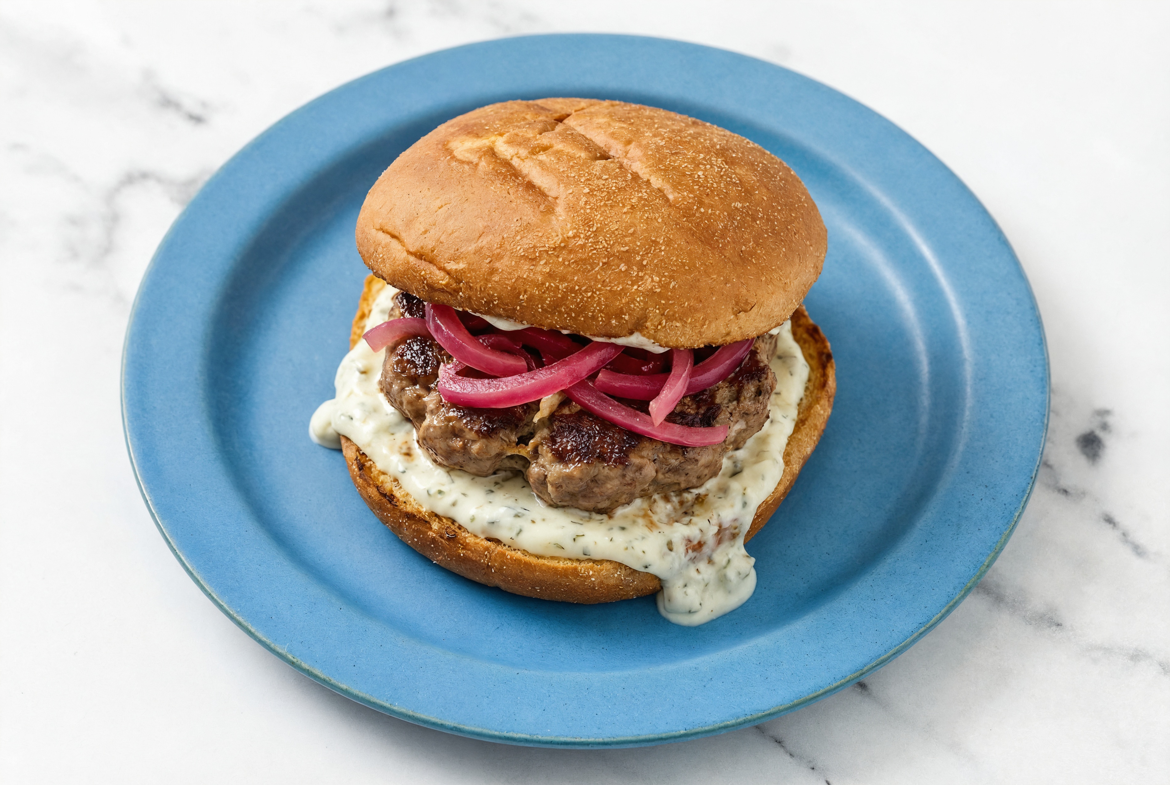 Tzatziki Lamb Burger with Pickled Red Onions