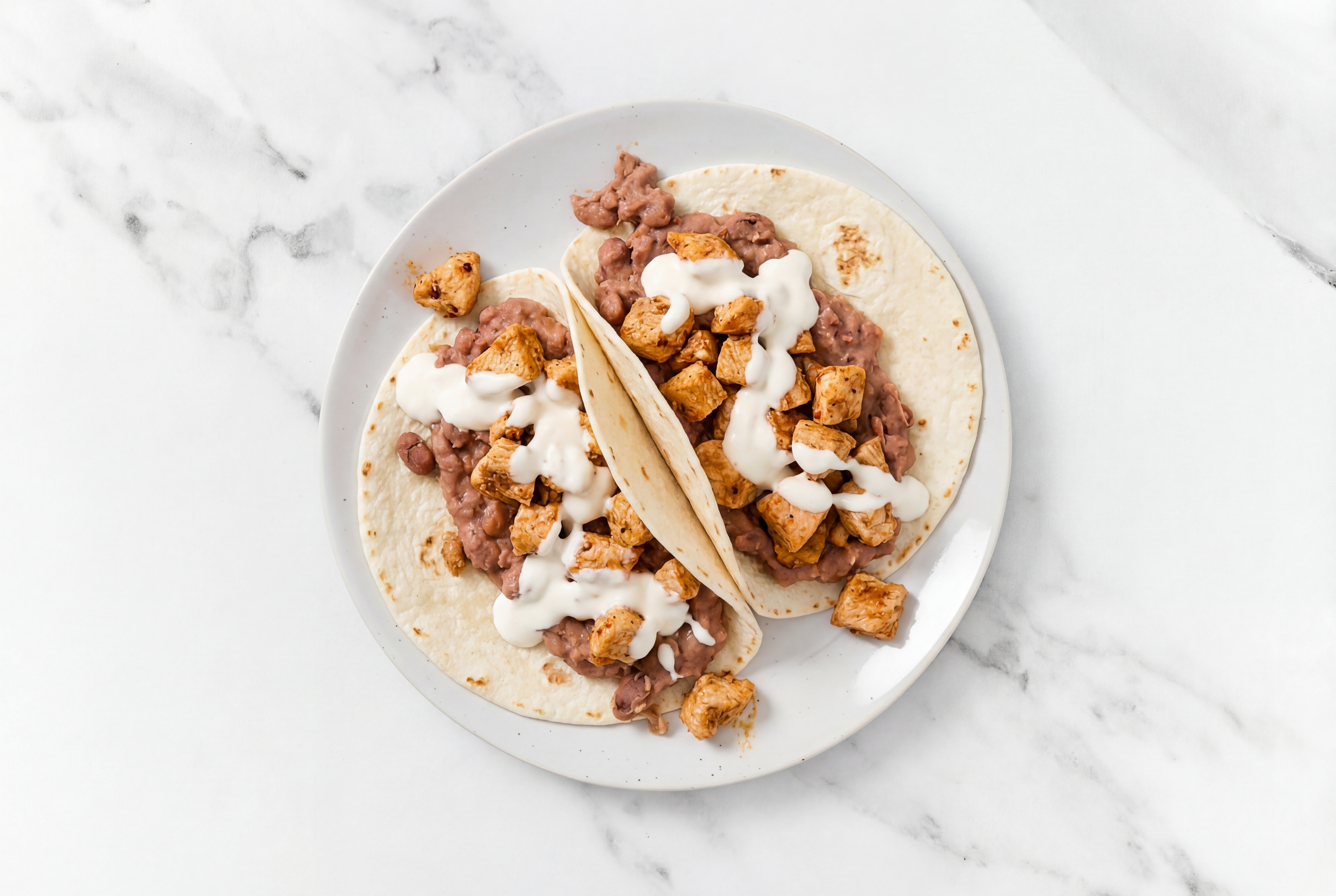  Chipotle Chicken Tacos with Crema & Refried Red Beans