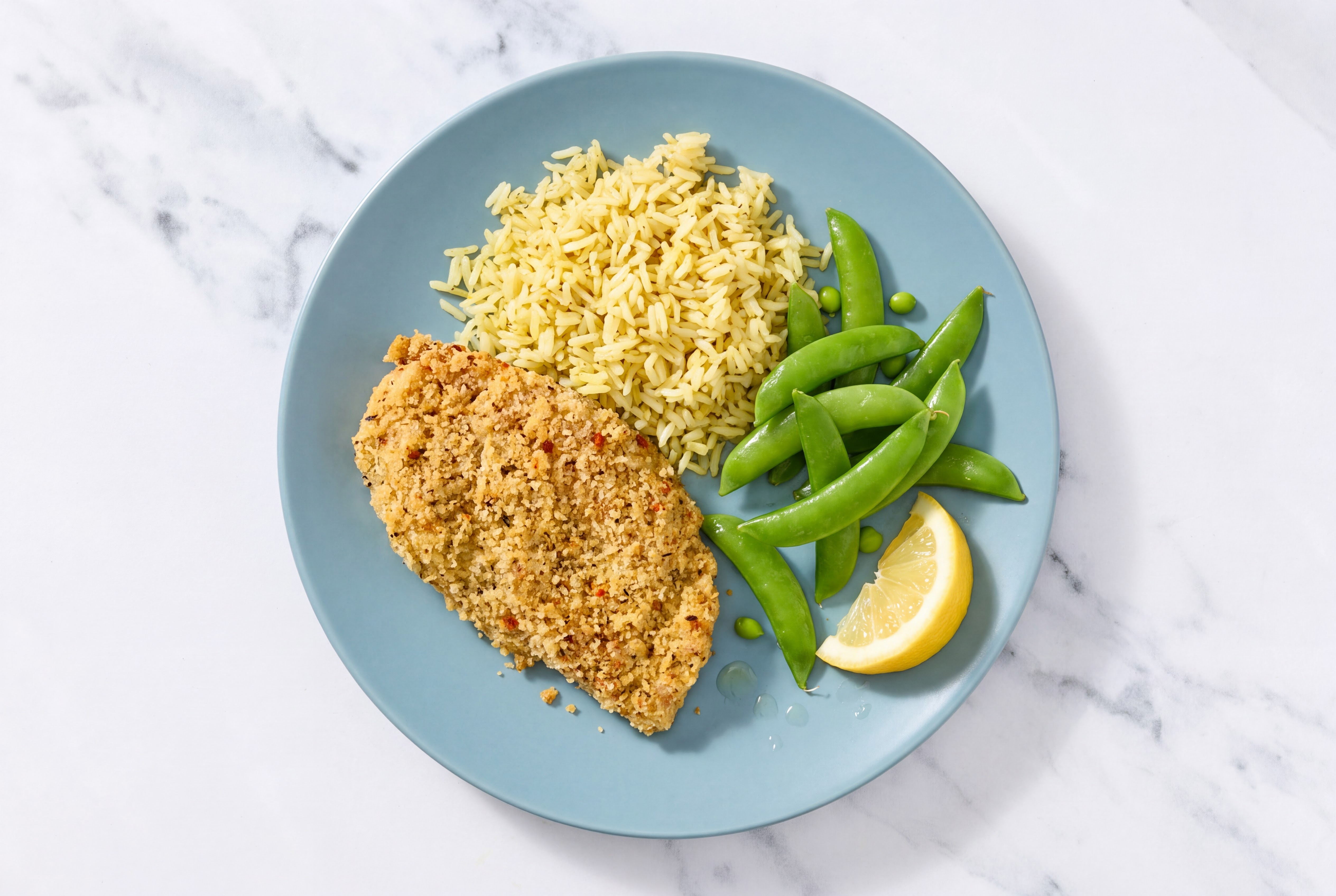 Lemon Parmesan Breaded Chicken Cutlet with Snap Peas & Jasmine Rice
