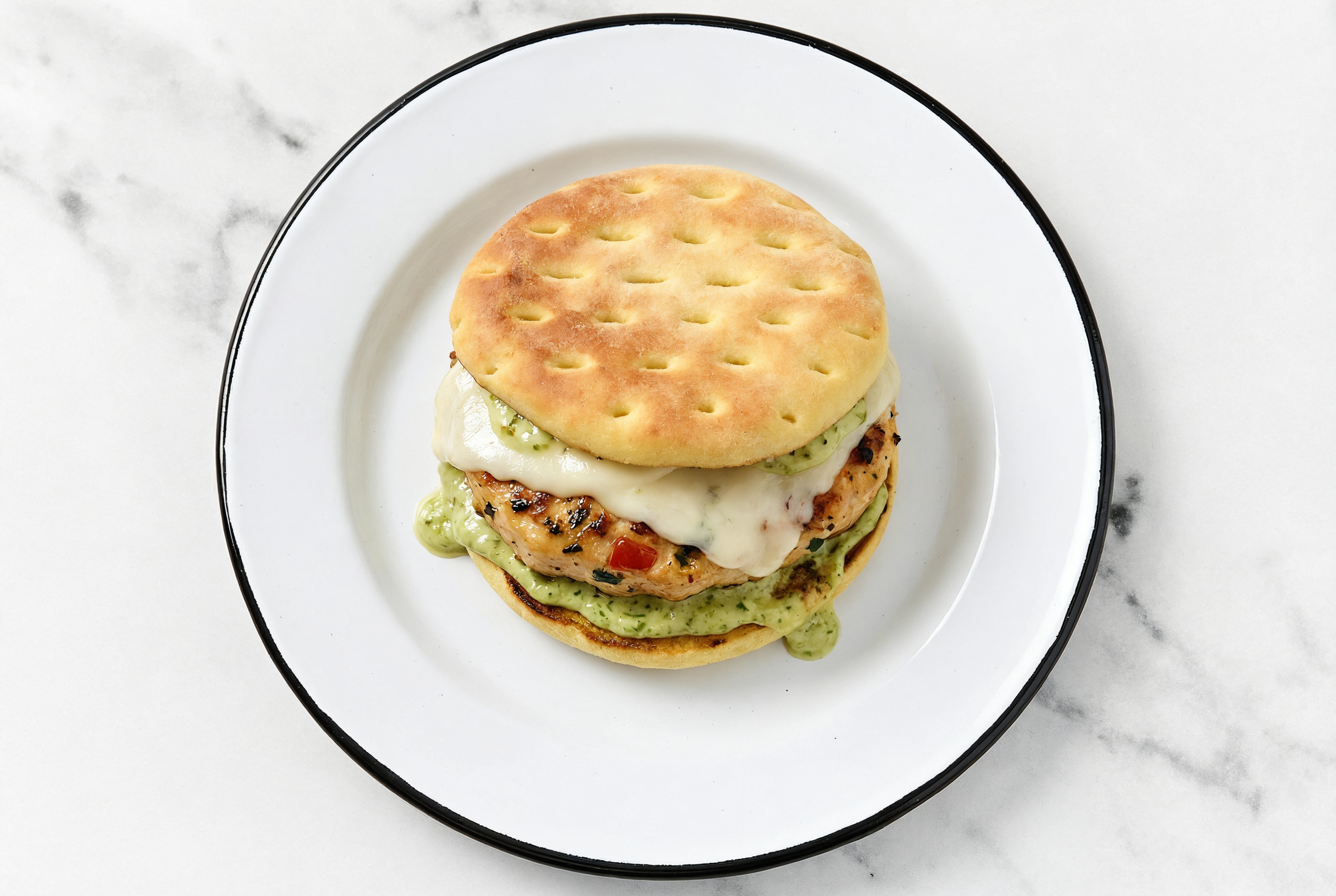 Bruschetta Chicken Patties with Mozzarella Bar + Pesto Aioli on Brioche Buns