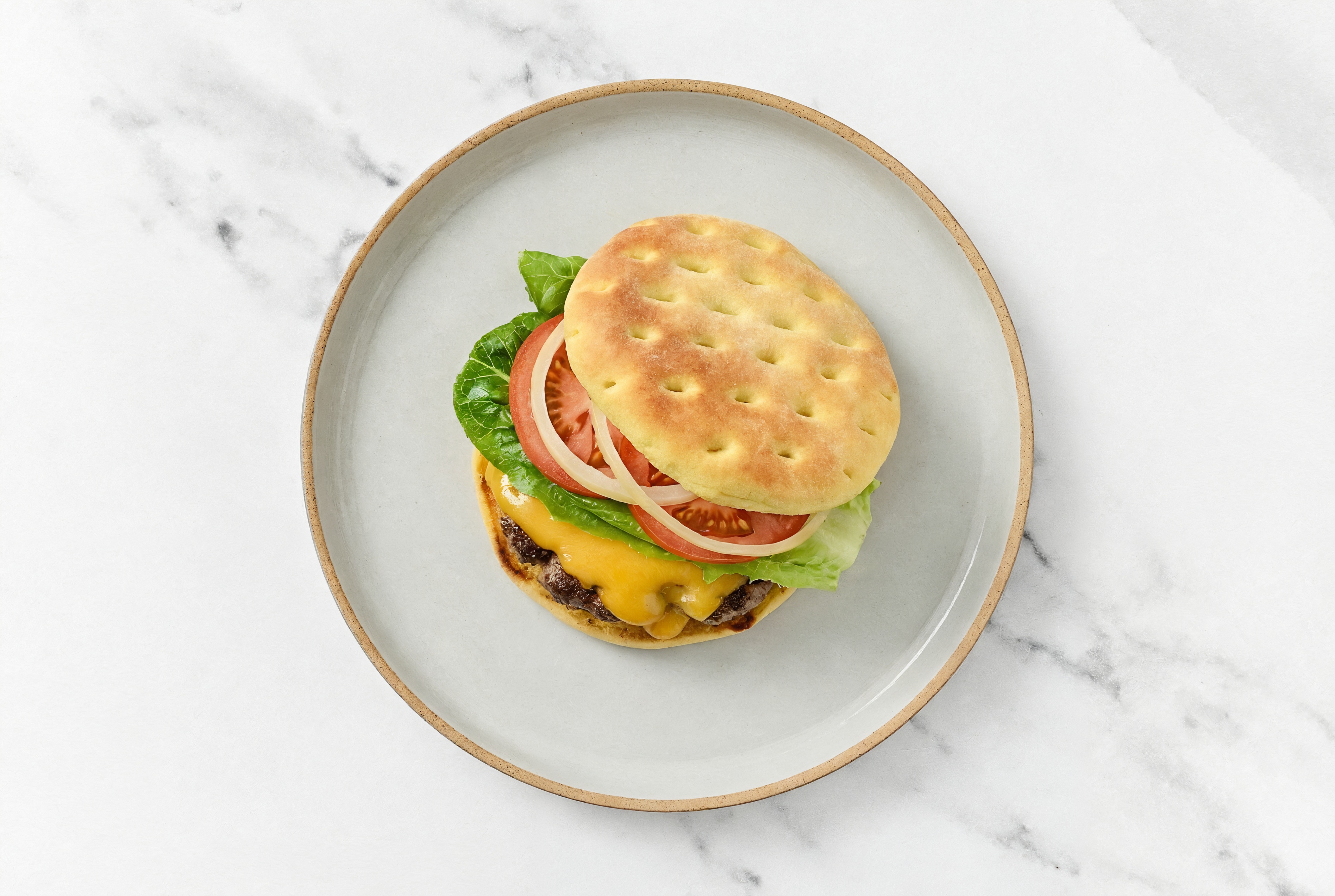 Herby Juicy Cheeseburger on Brioche Bun