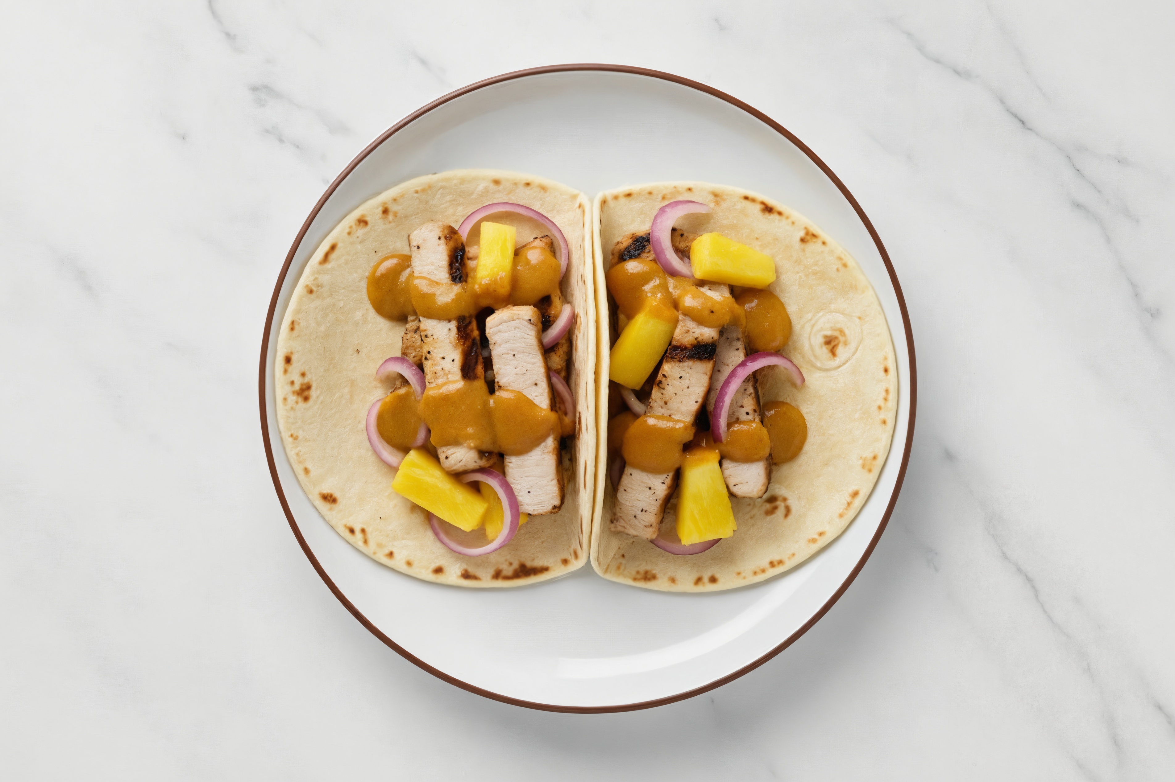 Coconut Curry Pork Chop Tacos with Pineapple + Red Onion