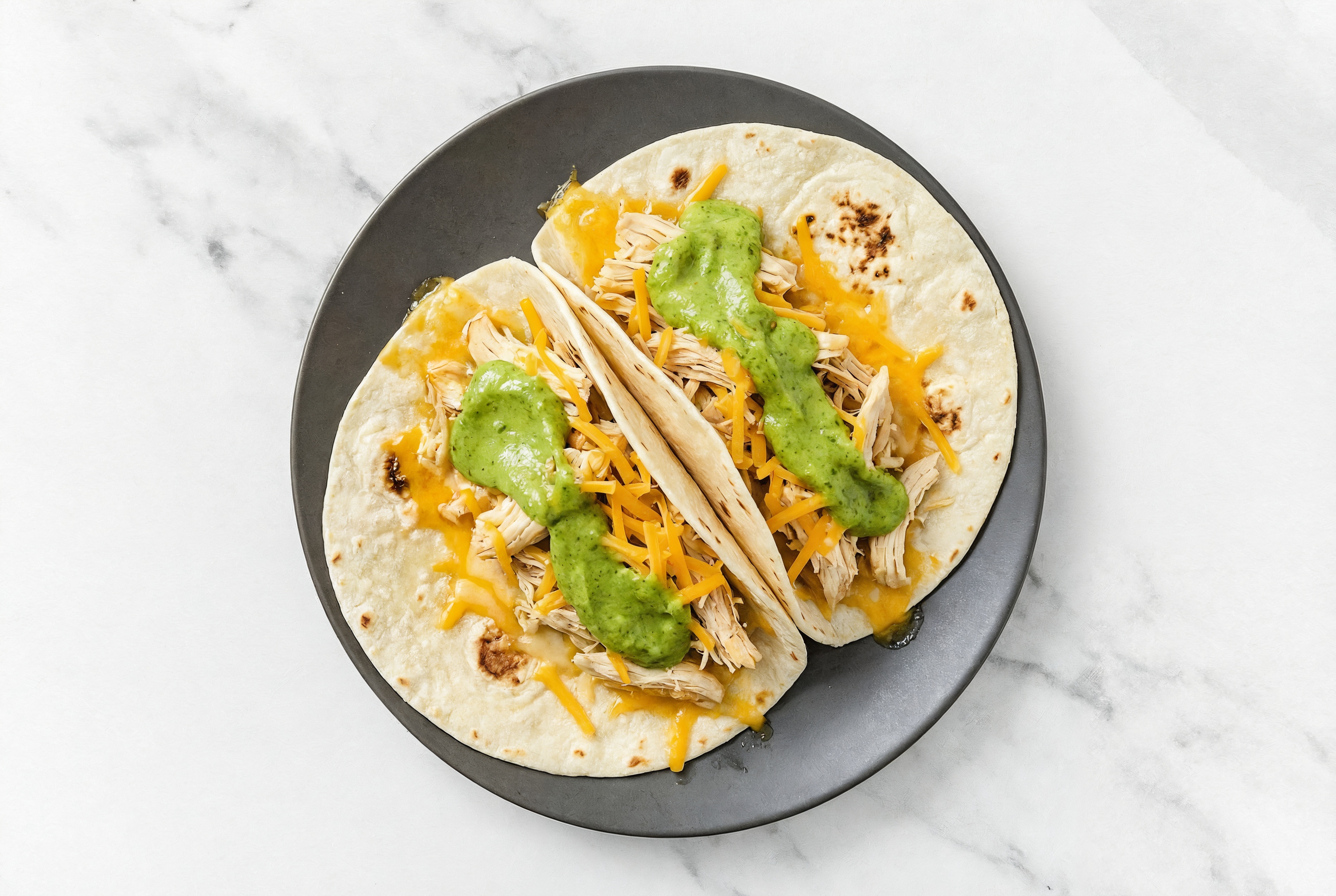 Pulled Chicken Taco with Avocado and Cheese
