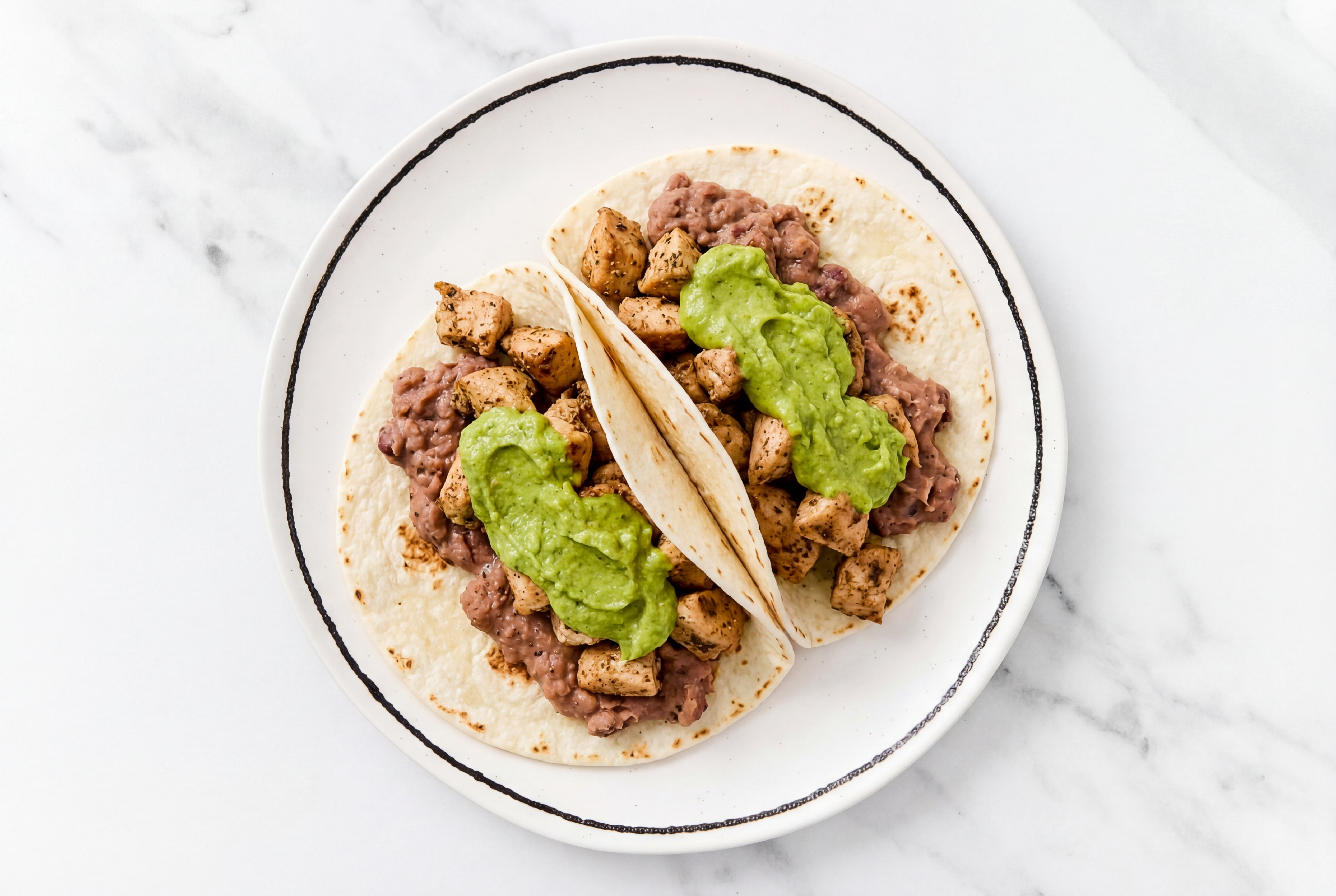  Garlic Chicken Tacos with Avocado & Refried Red Beans