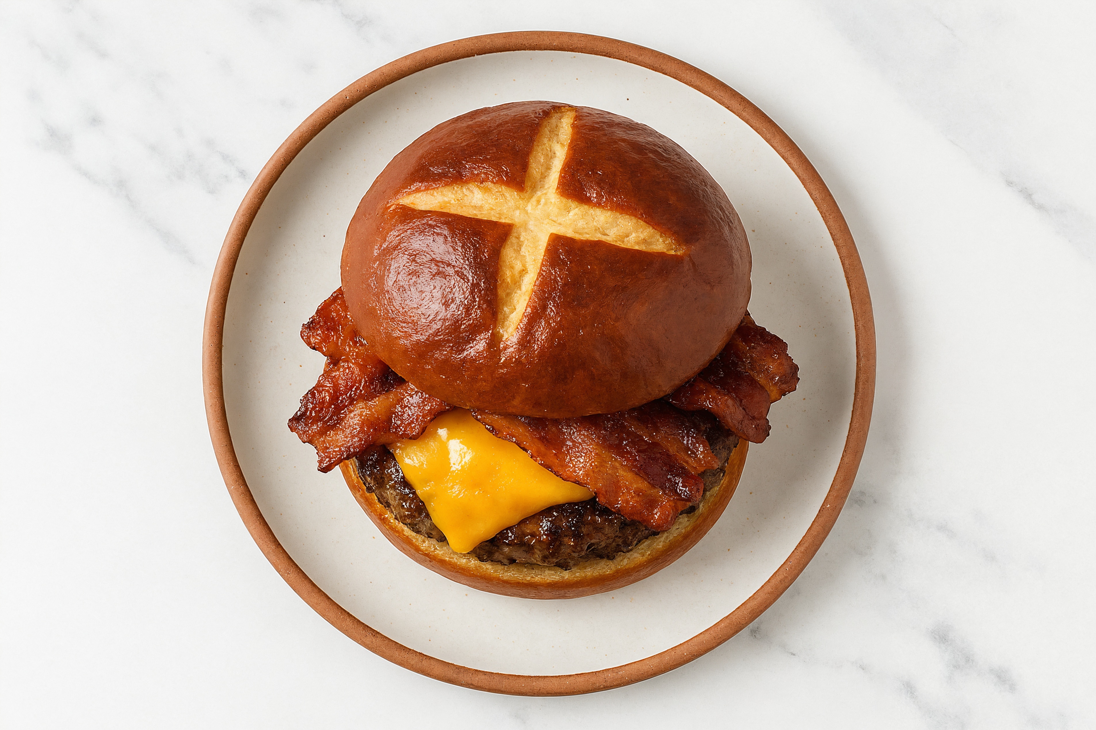 Juicy MyBacon Cheeseburger on Pretzel Bun with Tavern Beef Burger