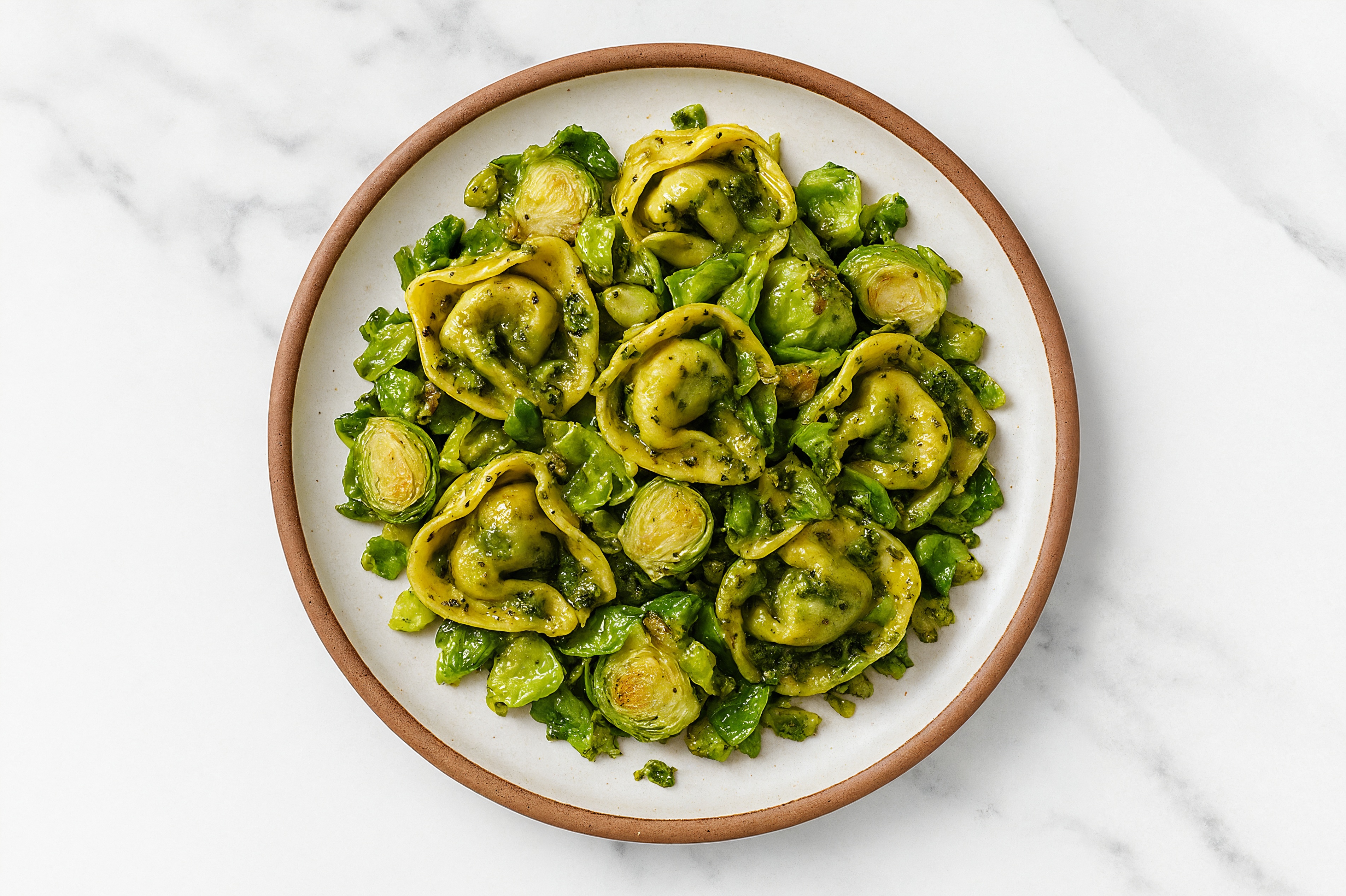 Basil Pesto Tortellini with Crispy Brussels