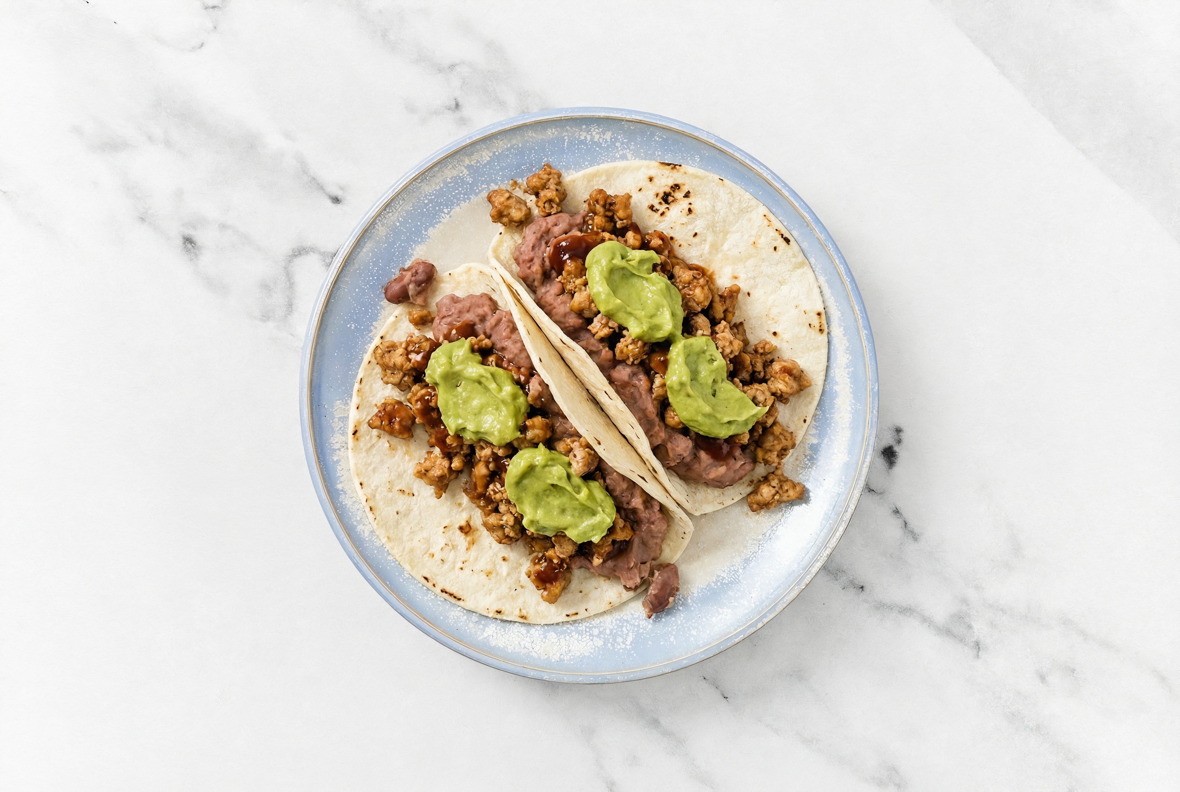 Hearty Ground Turkey Tacos with Guacamole & Refried Red Beans